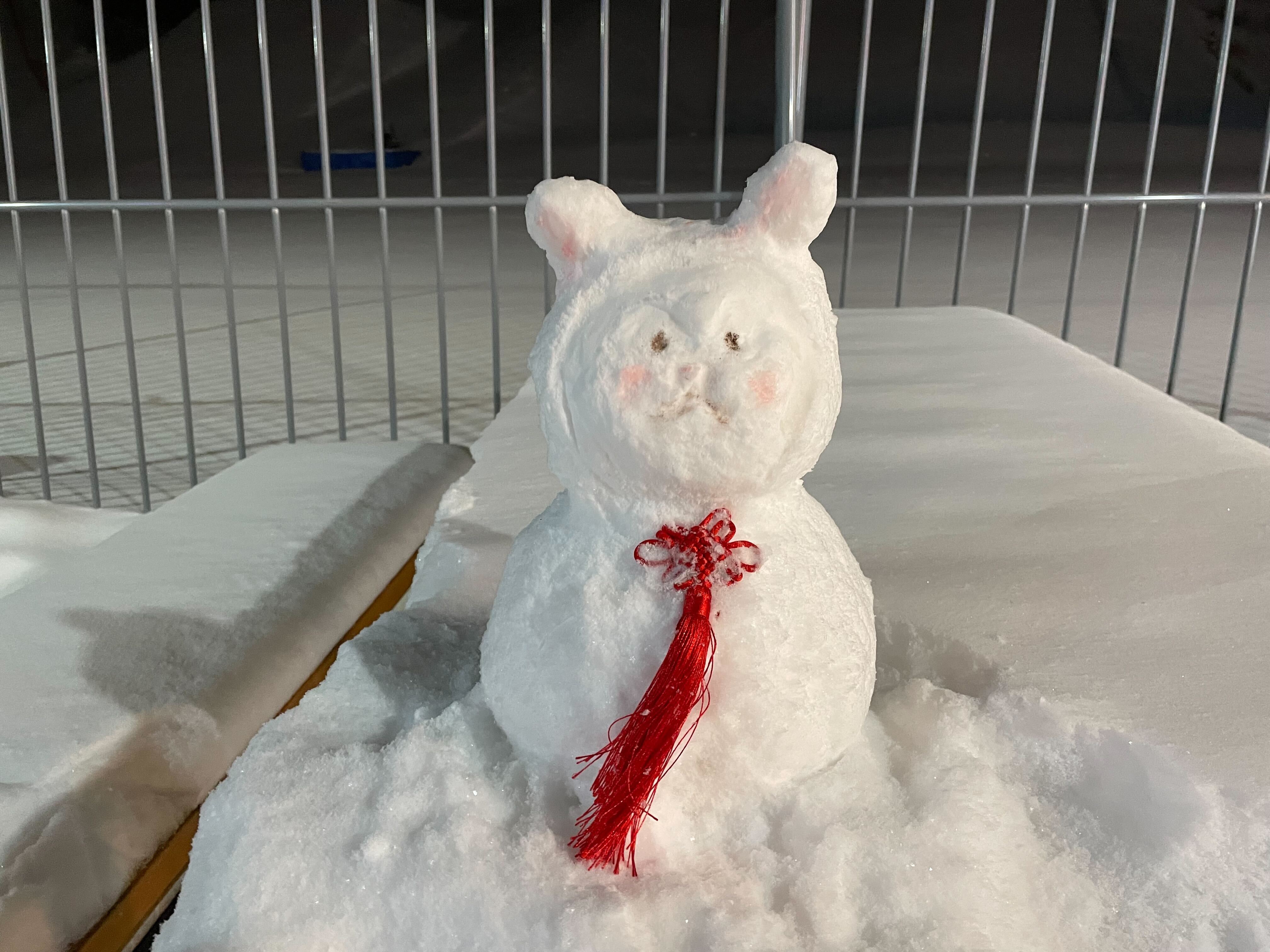 A cute snow creature made by a worker at the Genting Grand Secret Garden, home to the Zhangjiakou mountain press center.