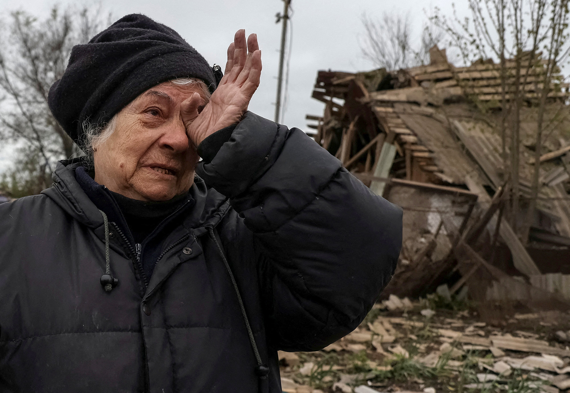 A local resident reacts as she stands among the remains of her house hit by a Russian military strike in the town of Pavlohrad, Dnipropetrovsk region, Ukraine, on May 1.