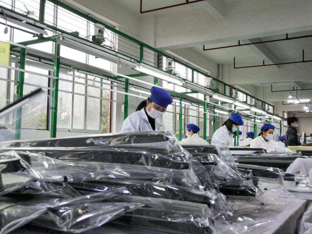 A pile of face shields ready to be shipped overseas at the factory in Guangdong province on April 8.