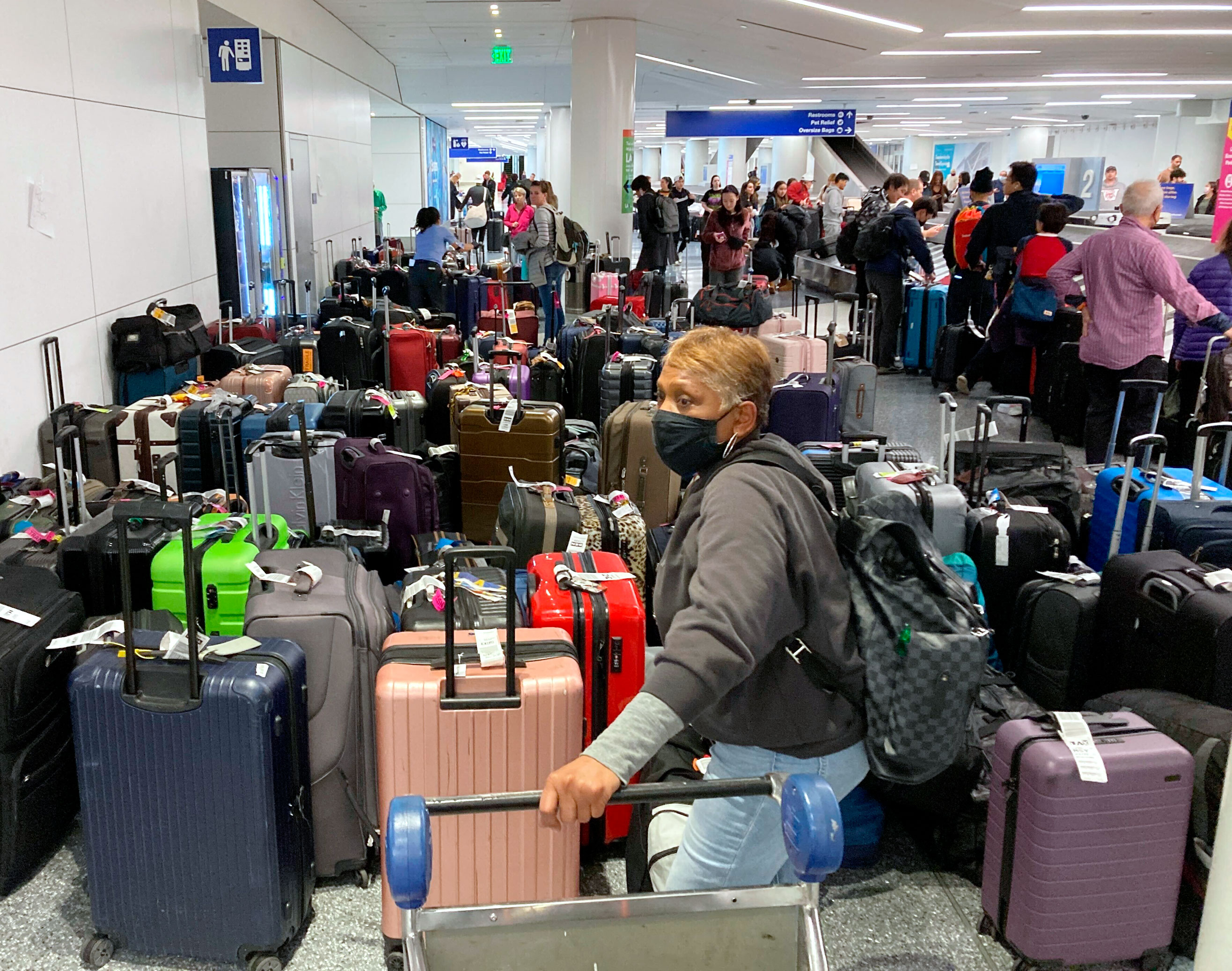 Baggage waits to be claimed at the Southwest Airlines terminal after canceled flights at the Los Angeles International Airport on Monday. 