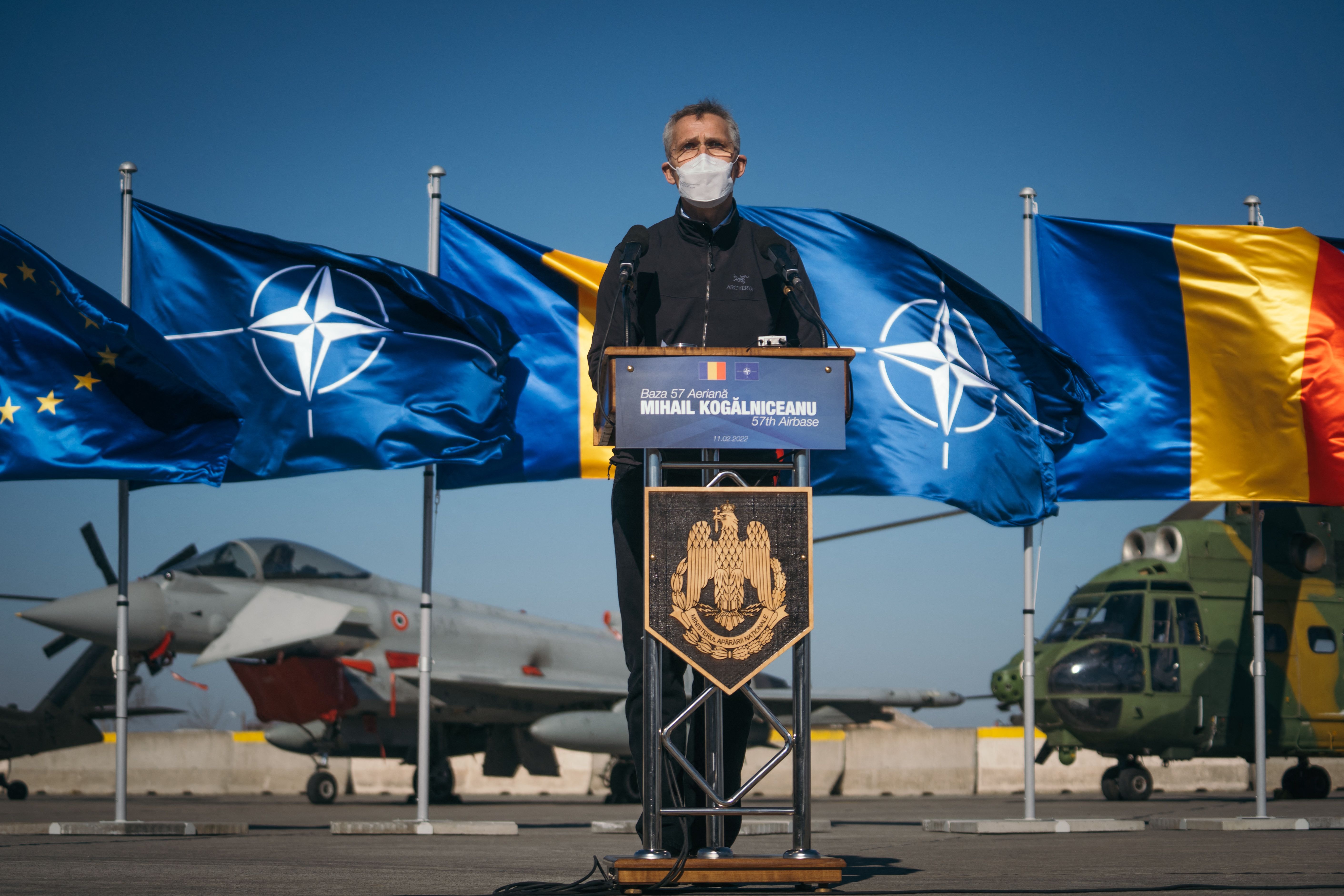 NATO Secretary General Jens Stoltenberg speaks during a visit at Mihail Kogalniceanu Military Base on February 11, in Mihail Kogalniceanu, Romania.