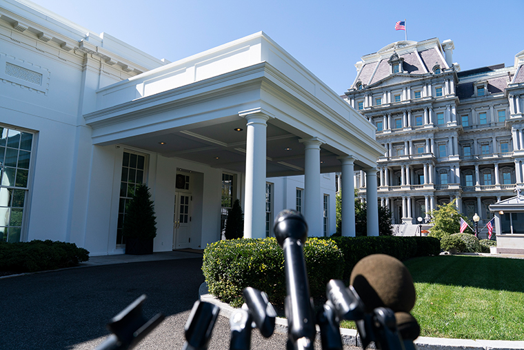 Microphones are placed in front of the West Wing of the White House and the Eisenhower Executive Office Building, Monday, Oct. 5, 2020, in Washington. 