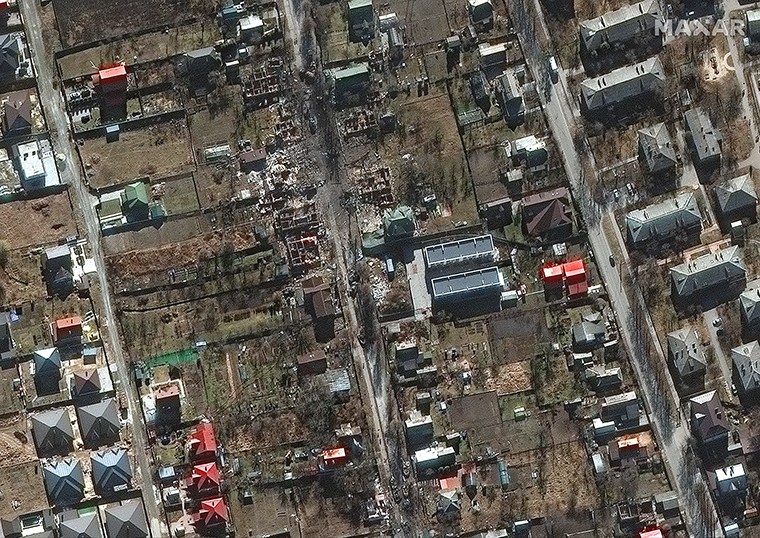 Burned remains of Russian military vehicles in a residential area in Bucha.