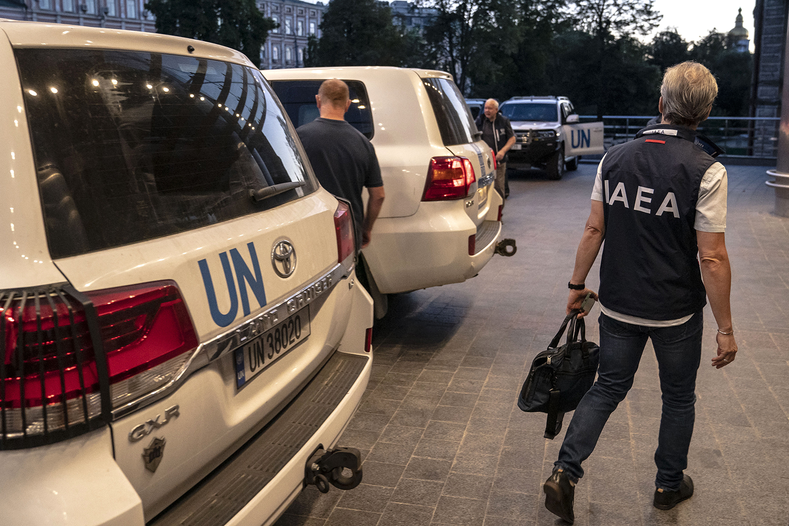 Personnel from the International Atomic Energy Agency and the United Nations prepare to depart for Zaporizhzhia from a hotel in Kyiv, Ukraine on August 31.