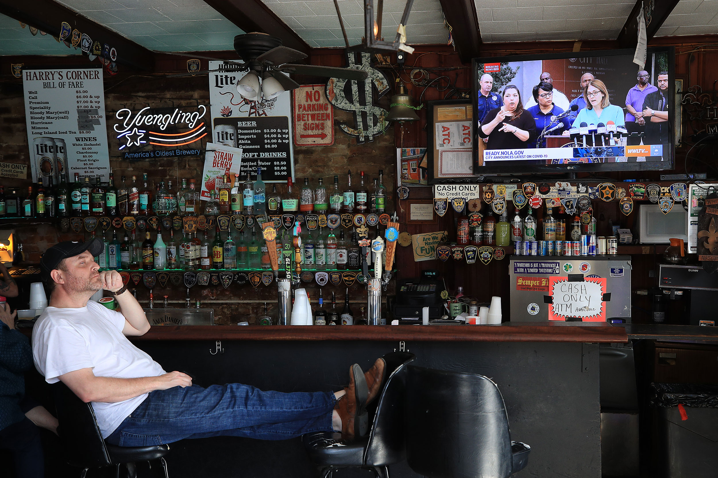 A man sits at a bar in New Orleans, Louisiana, on March 15.