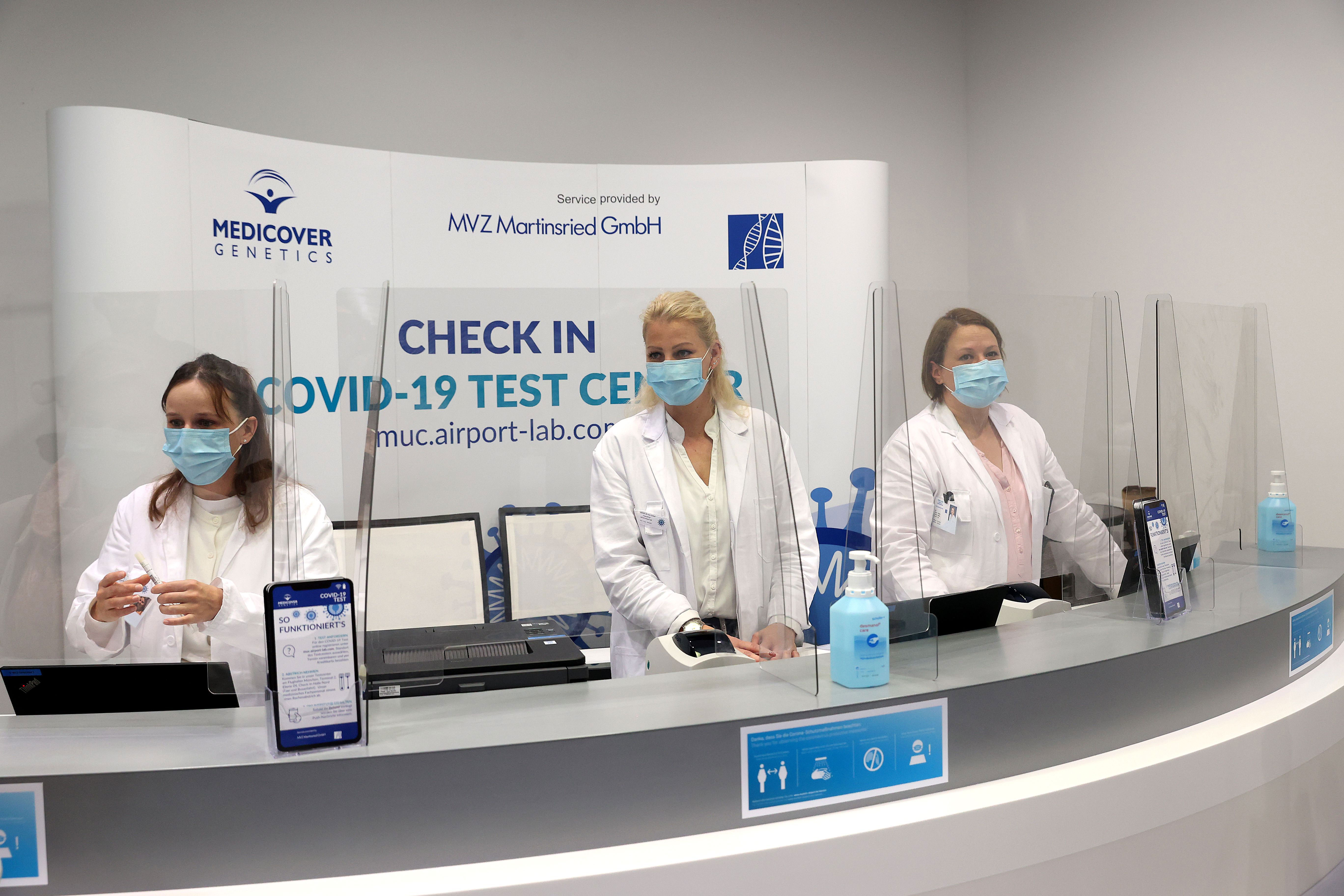 Staff at the Test to Fly Center in Germany's Munich Airport wait to test passengers prior to a Lufthansa flight on November 12.