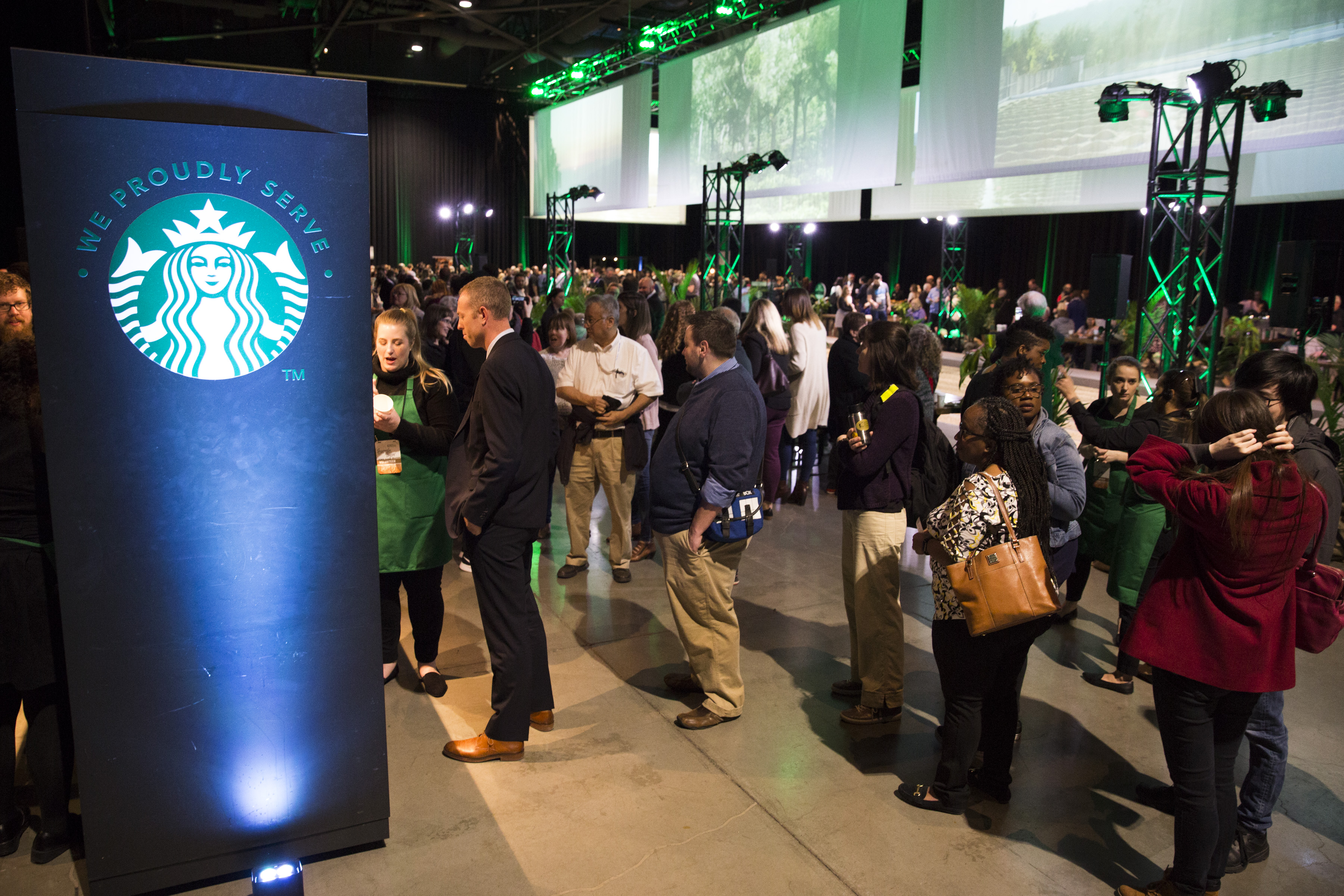 Shareholders line up for coffee at the Annual Meeting of Shareholders in Seattle, Washington on March 20, 2019.