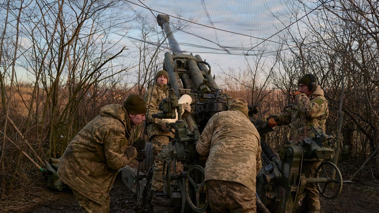 In this December 2022 photo, a Ukrainian artillery brigade operates a US-made Howitzer M777 cannon in the eastern Ukrainian town of Bakhmut.