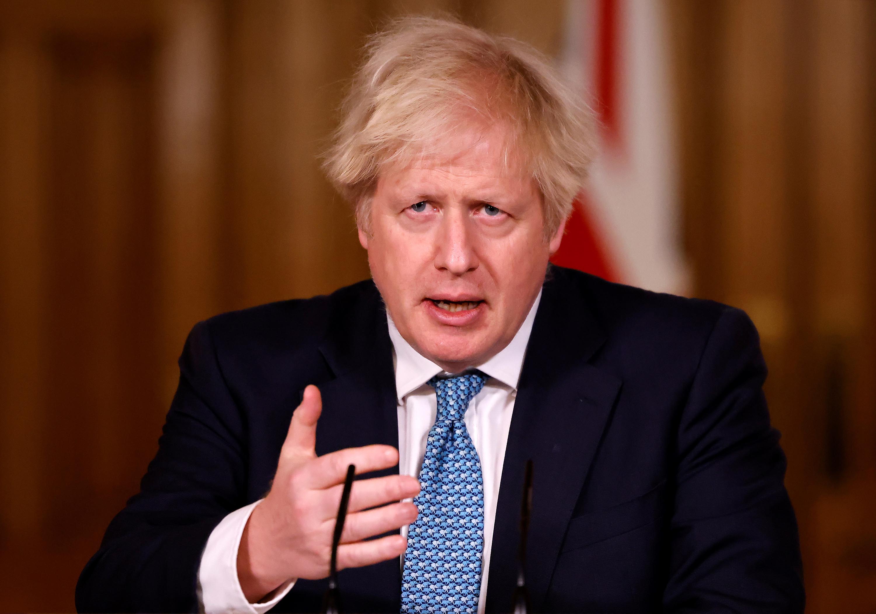 British Prime Minister Boris Johnson speaks during a virtual press conference at No.10 Downing Street in London, on January 7.