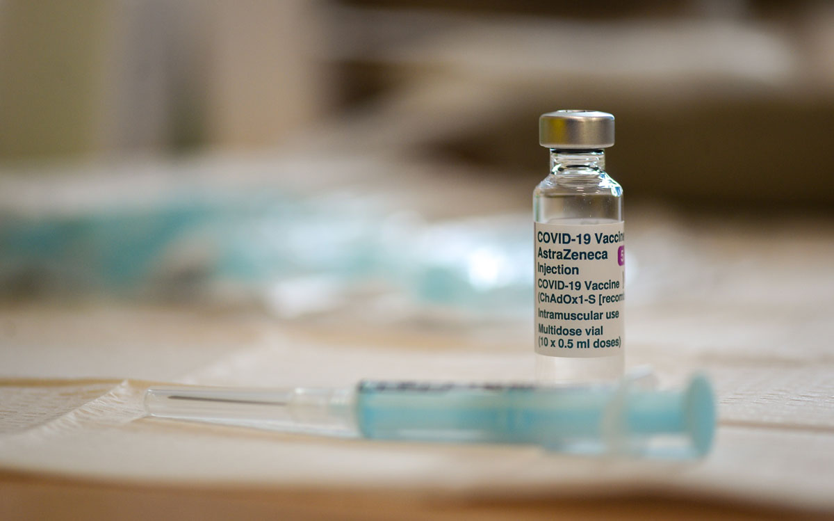 An Oxford AstraZeneca Covid-19 vaccine vial and syringes are seen at a medical centre in Bridport, England on March 20.