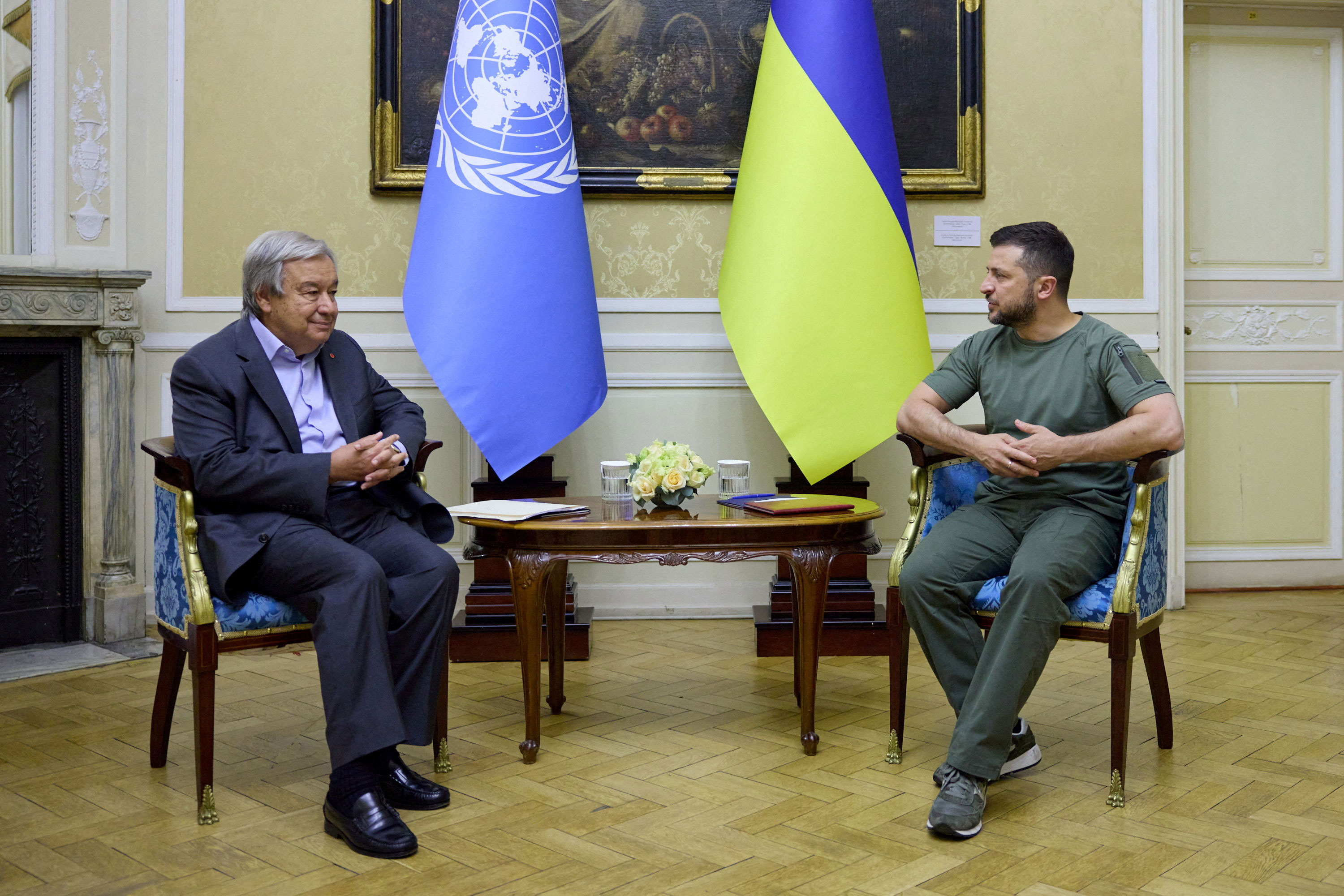 UN Secretary-General Antonio Guterres, left, and Ukraine's President Volodymyr Zelensky post for photos during a meeting in Lviv, Ukraine, on Thursday.