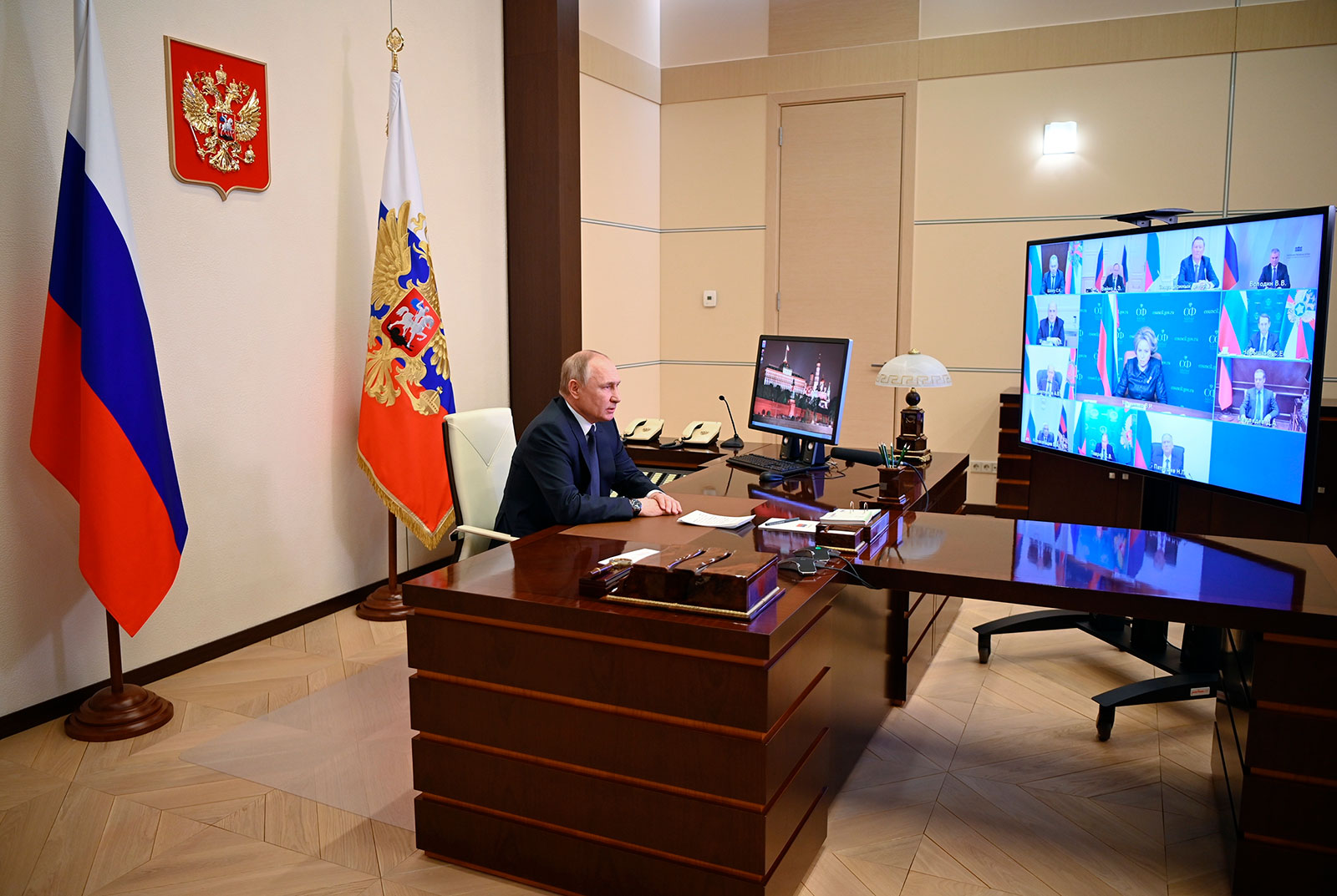 Russian President Vladimir Putin meets virtually with members of his security council in Moscow on March 3.