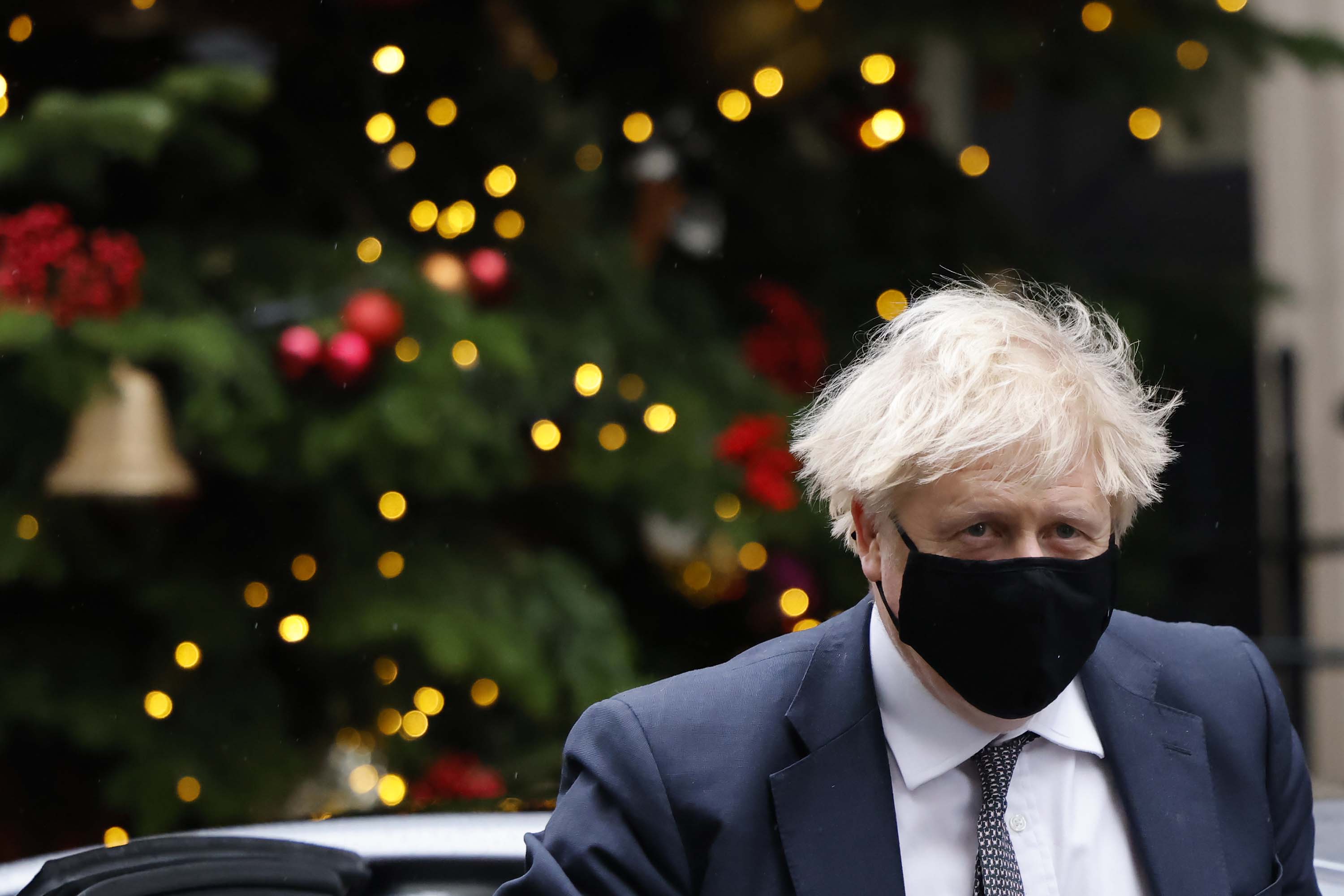 Britain's Prime Minister Boris Johnson is pictured outside 10 Downing Street in central London on December 16.