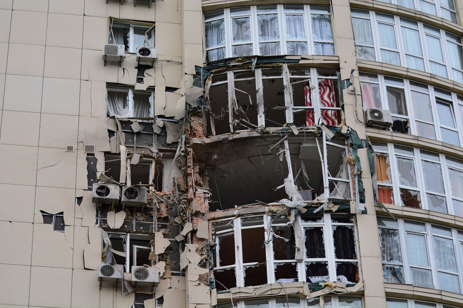 Broken windows and a damaged facade of a residential building are seen as a result of a Russian attack with Iran-made Shahed drones in in Kyiv on May 8.
