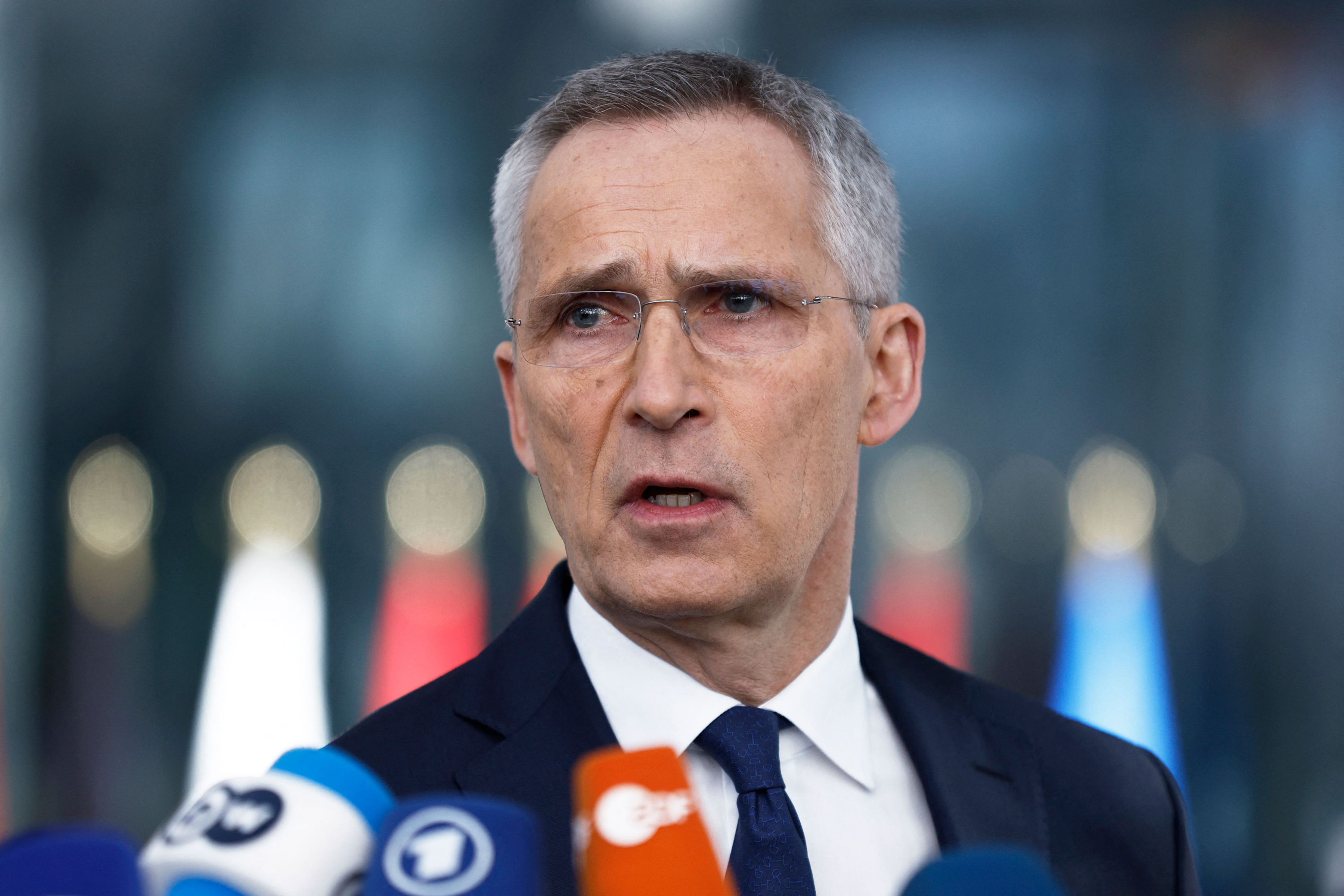 Jens Stoltenberg speaks to the press ahead of a meeting at the NATO headquarters in Brussels, on April 4.