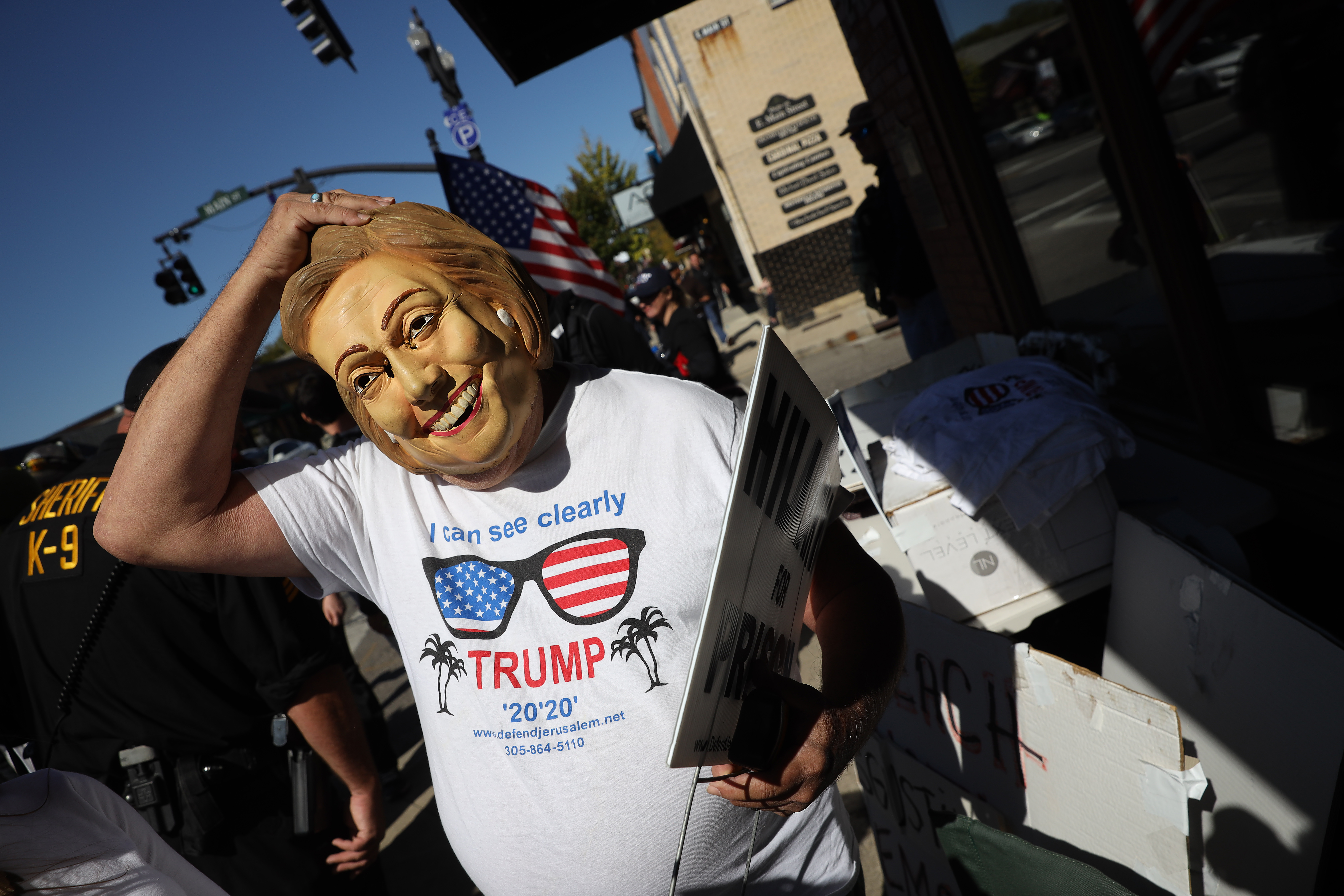 Supporters of US President Trump and gun rights supporters demonstrate in downtown Westerville, site of this evening’s Democratic presidential debate, on Oct. 15, 2019 in Westerville, Ohio.  