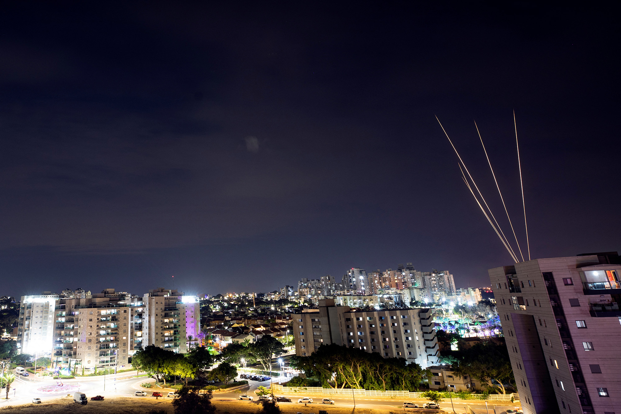 Rockets are fired towards Israel from the northern Gaza Strip, as seen from Ashkelon, southern Israel, on October 7.