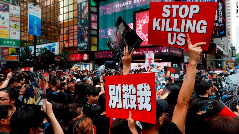 Protesters march in the streets against an extradition bill in Hong Kong on Sunday, June 16th.