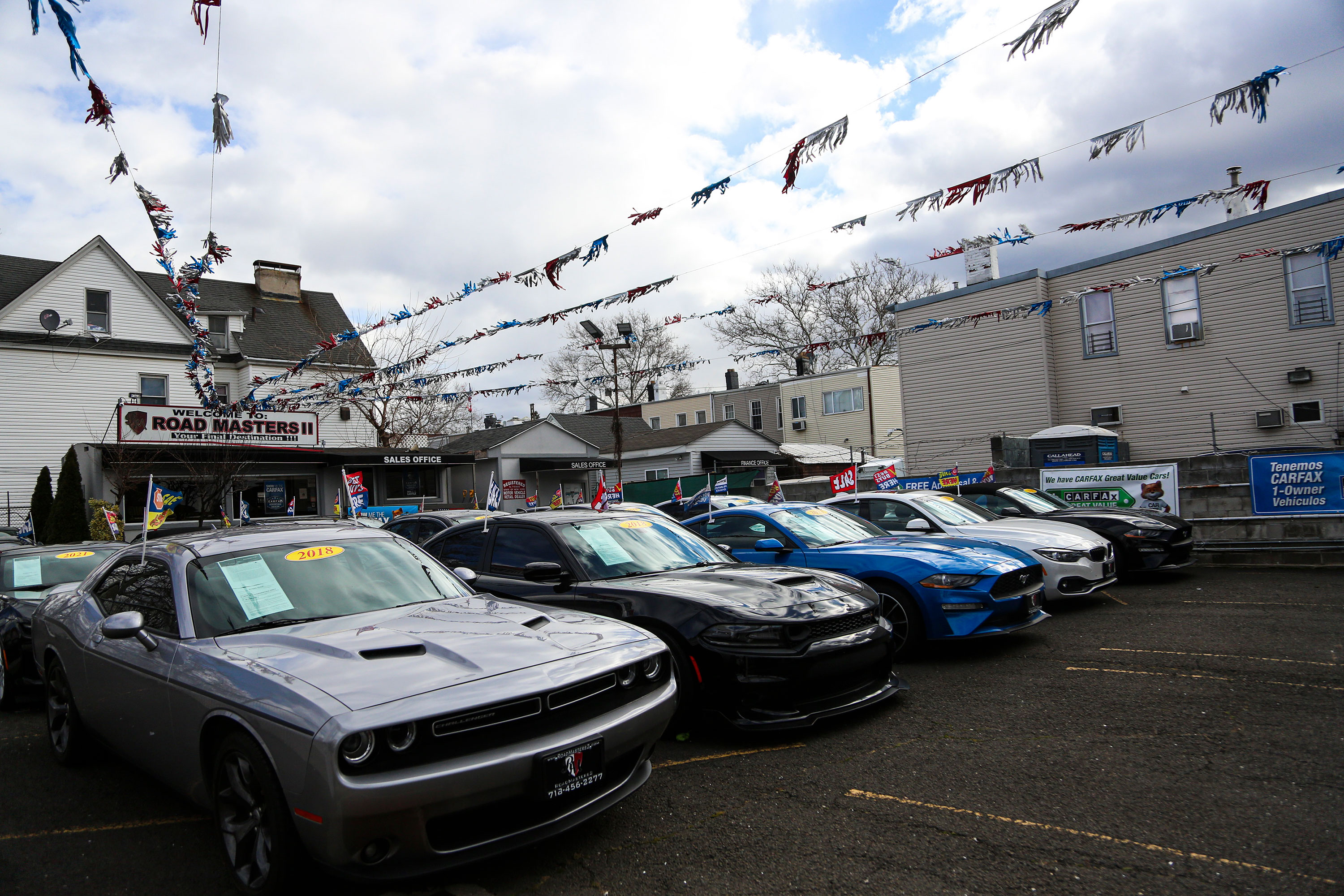 Used cars sit on lot at a dealership in Queens, New York, in January.