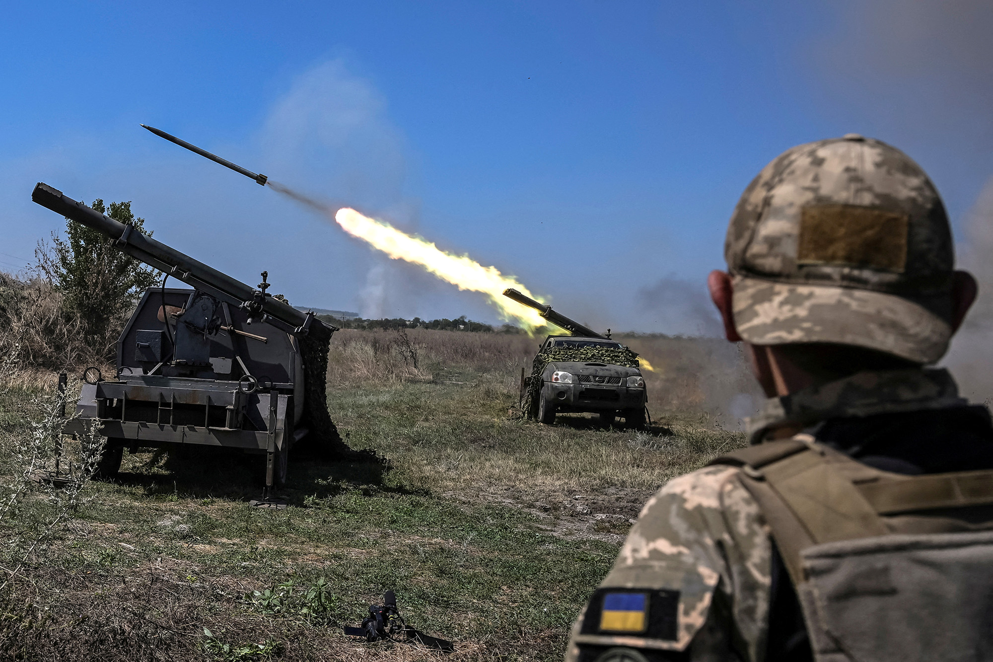 Ukrainian servicemen fire small multiple launch rocket systems towards Russian troops near a front line in Zaporizhzhia region, Ukraine, on August 19.