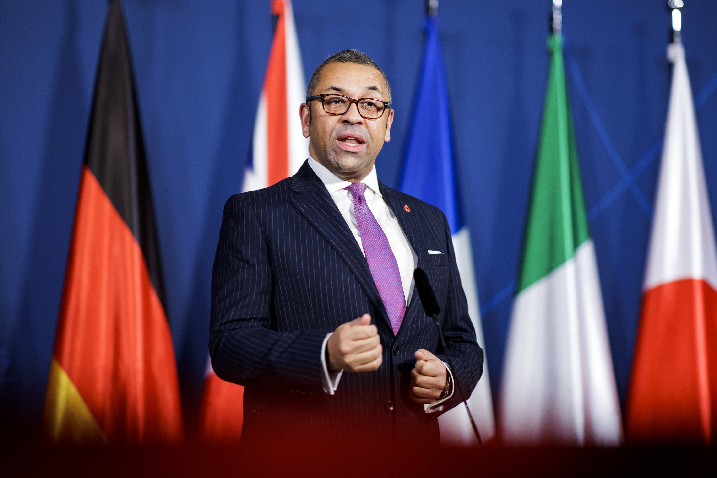 British Foreign Secretary James Cleverly speaks to the media during a doorstep before a meeting of the G7 Foreign Ministers on November 4, in Muenster, Germany. 