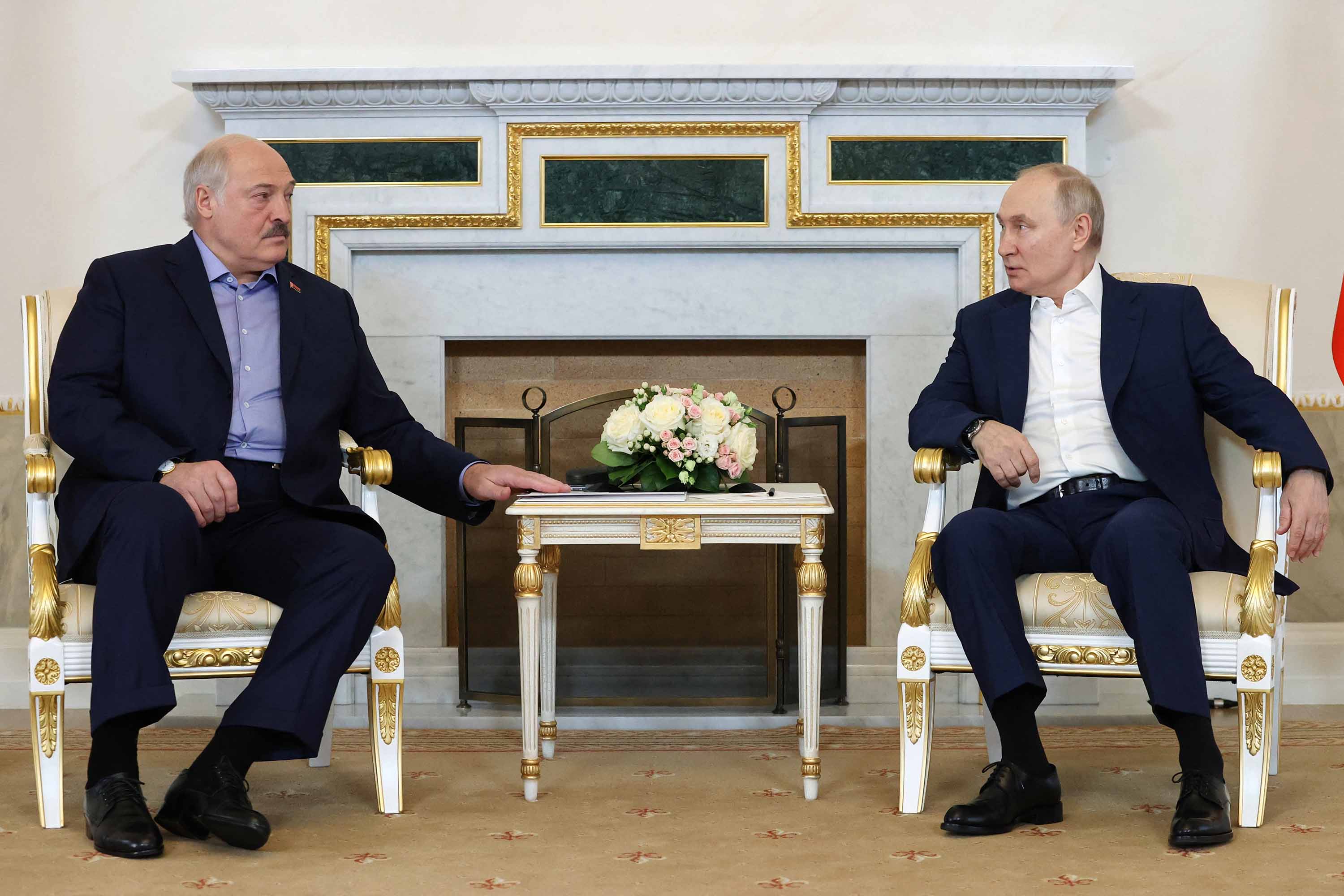 Russian President Vladimir Putin, right, meets with Belarusian President Alexander Lukashenko in Strelna, outside Saint Petersburg, Russia, on July 23. 