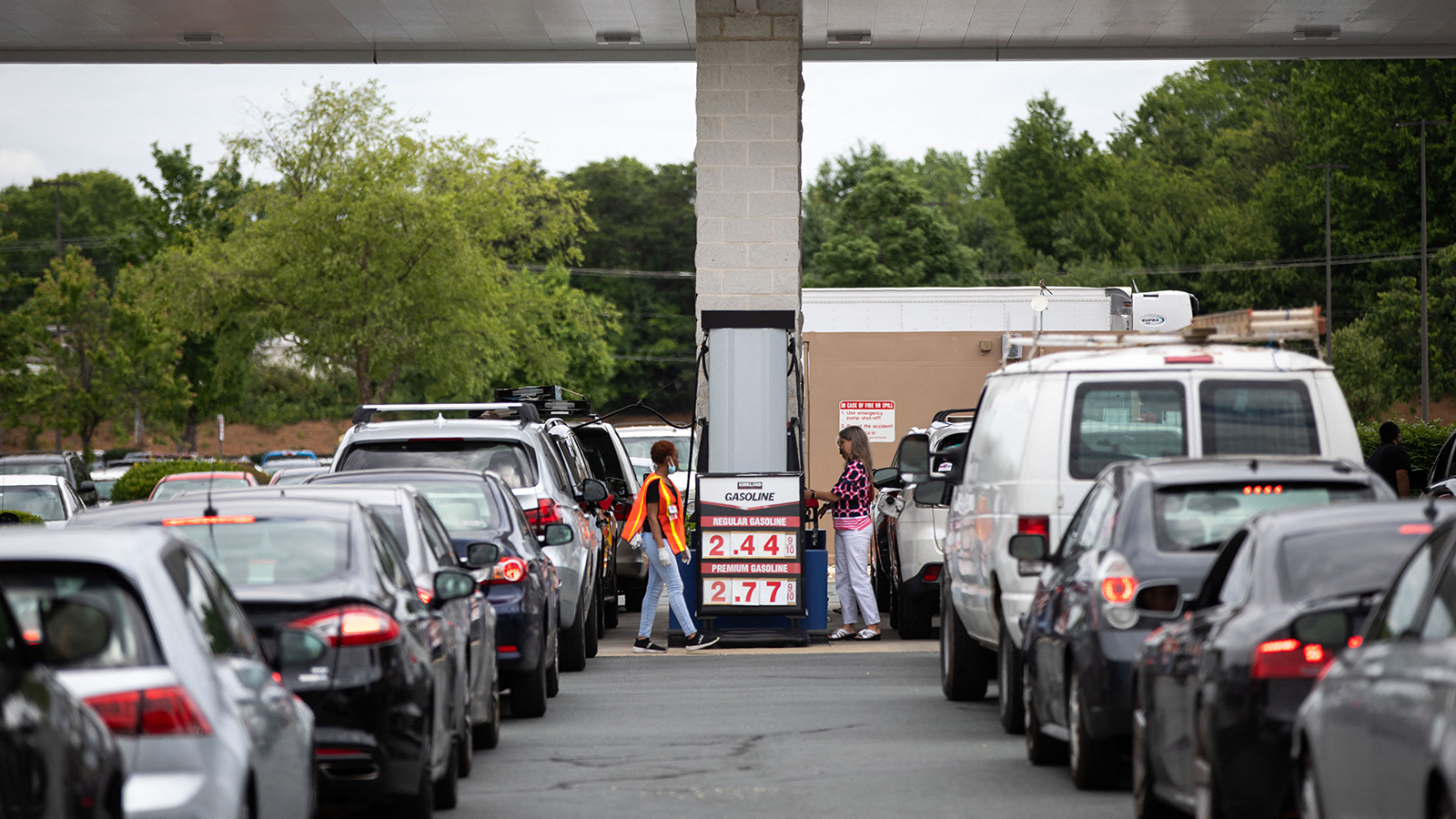Cars line up to fill their gas tanks at a Costco at Tyvola Road in Charlotte, North Carolina, on May 11.