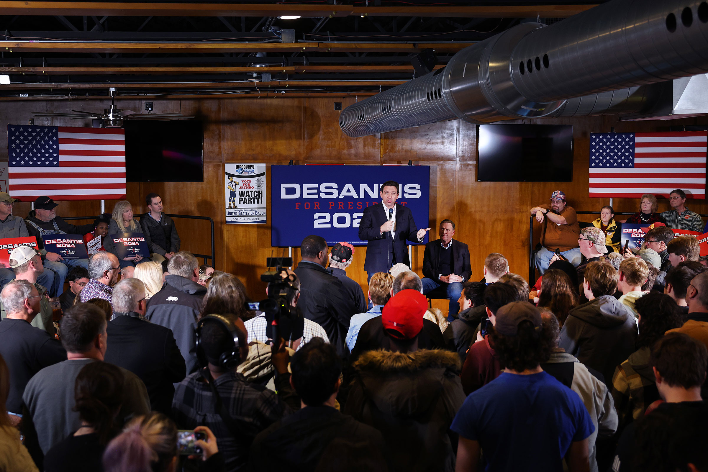 Florida Gov. Ron DeSantis speaks at a campaign event at Jethro's BBQ on January 11, in Ames, Iowa.