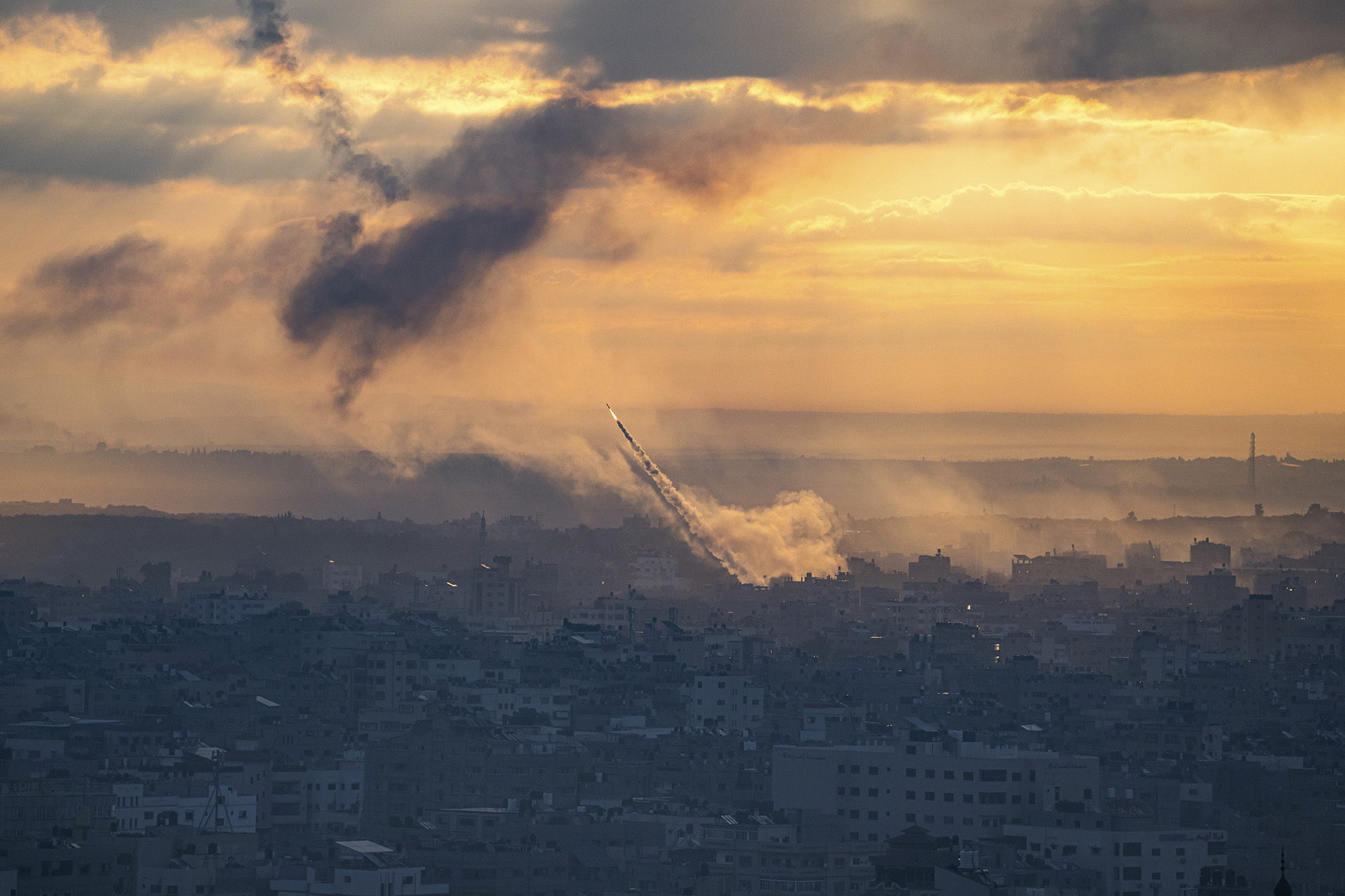 Rockets are fired toward Israel from the Gaza Strip, on October 7.