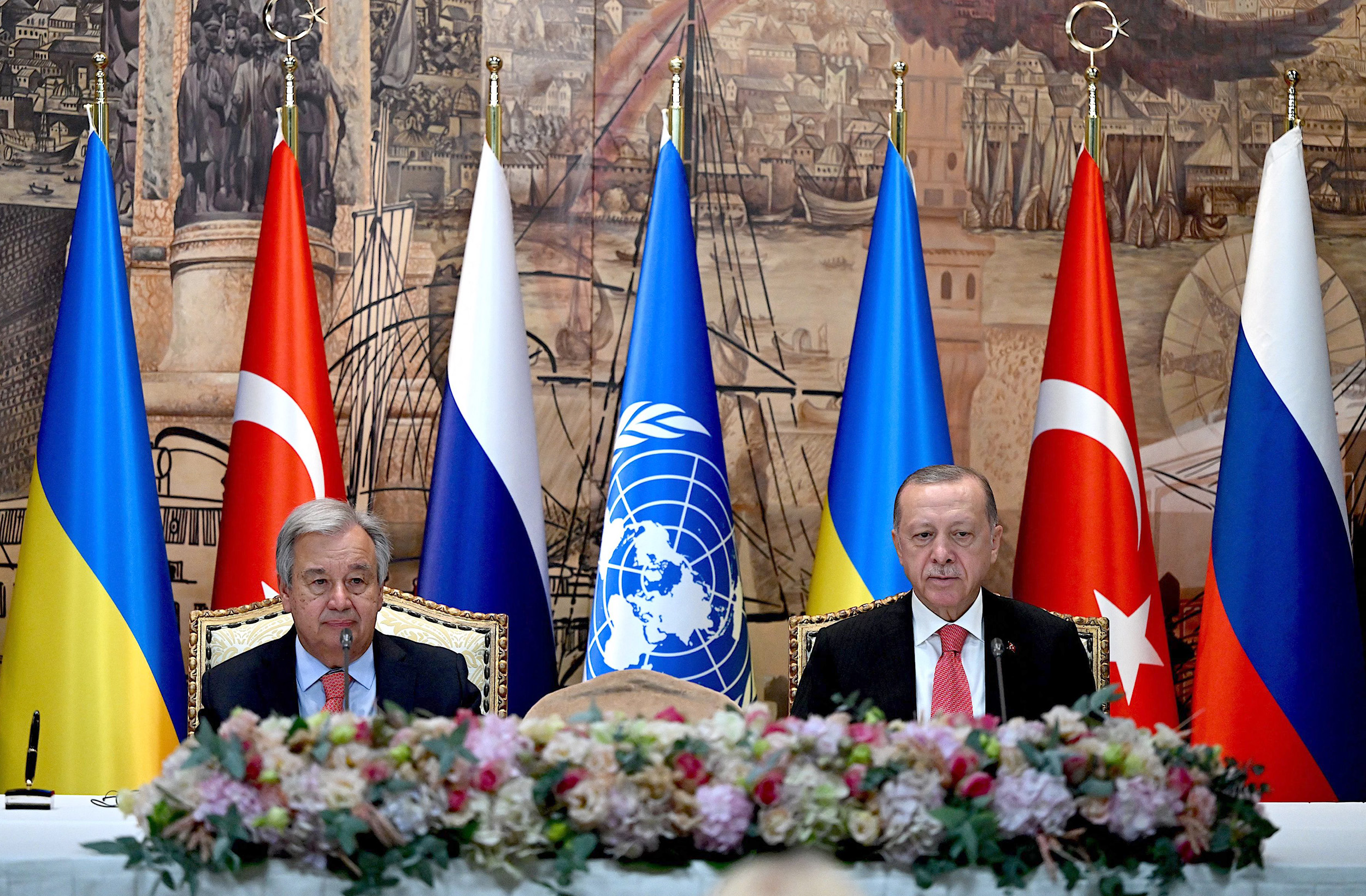 United Nations Secretary-General Antonio Guterres, left, and Turkish President Recep Tayyip Erdogan, right, sit at the start of the signature ceremony for the safe transportation of grain and foodstuffs from Ukrainian ports, in Istanbul, Turkey, on July 22