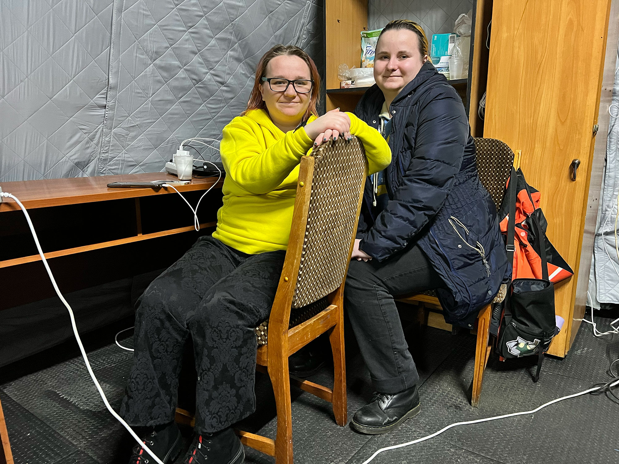 Tetiana, left, and Larysa inside an invincibility point in Kyiv, Ukraine. 