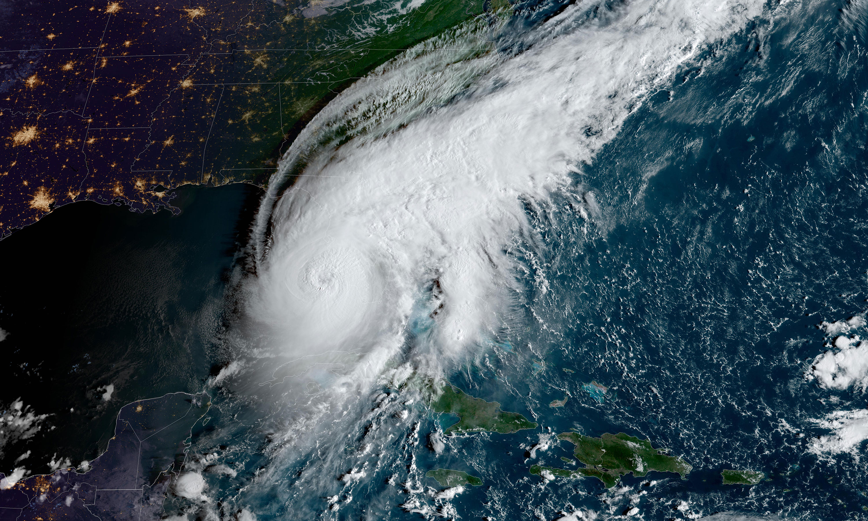 A satellite image from the National Oceanic and Atmospheric Administration shows Hurricane Ian approaching Florida on Wednesday at 8:31 a.m. ET.