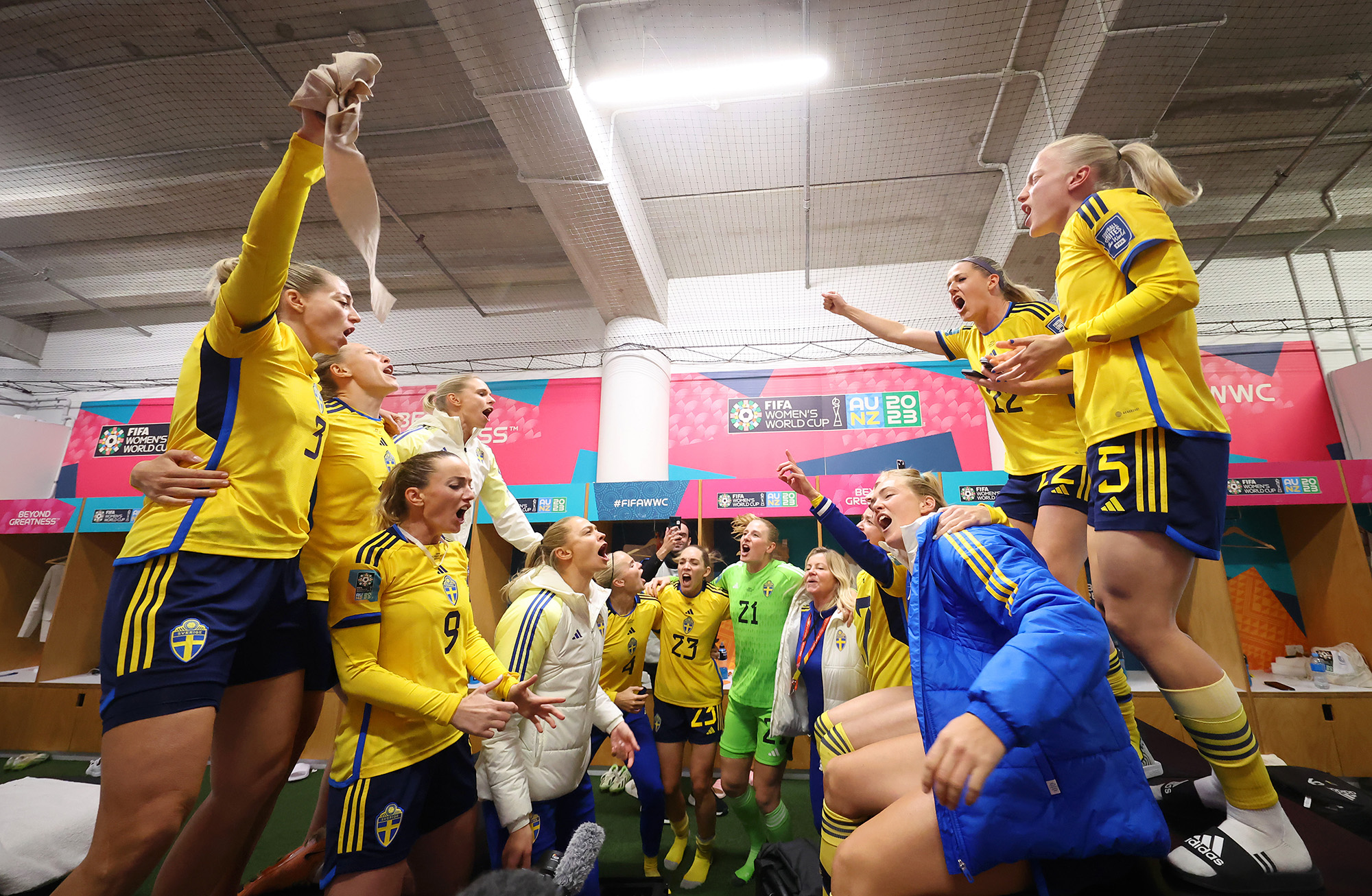 Sweden players celebrate after the team's 2-1 victory over Japan. The squad will face Spain in the semifinal.
