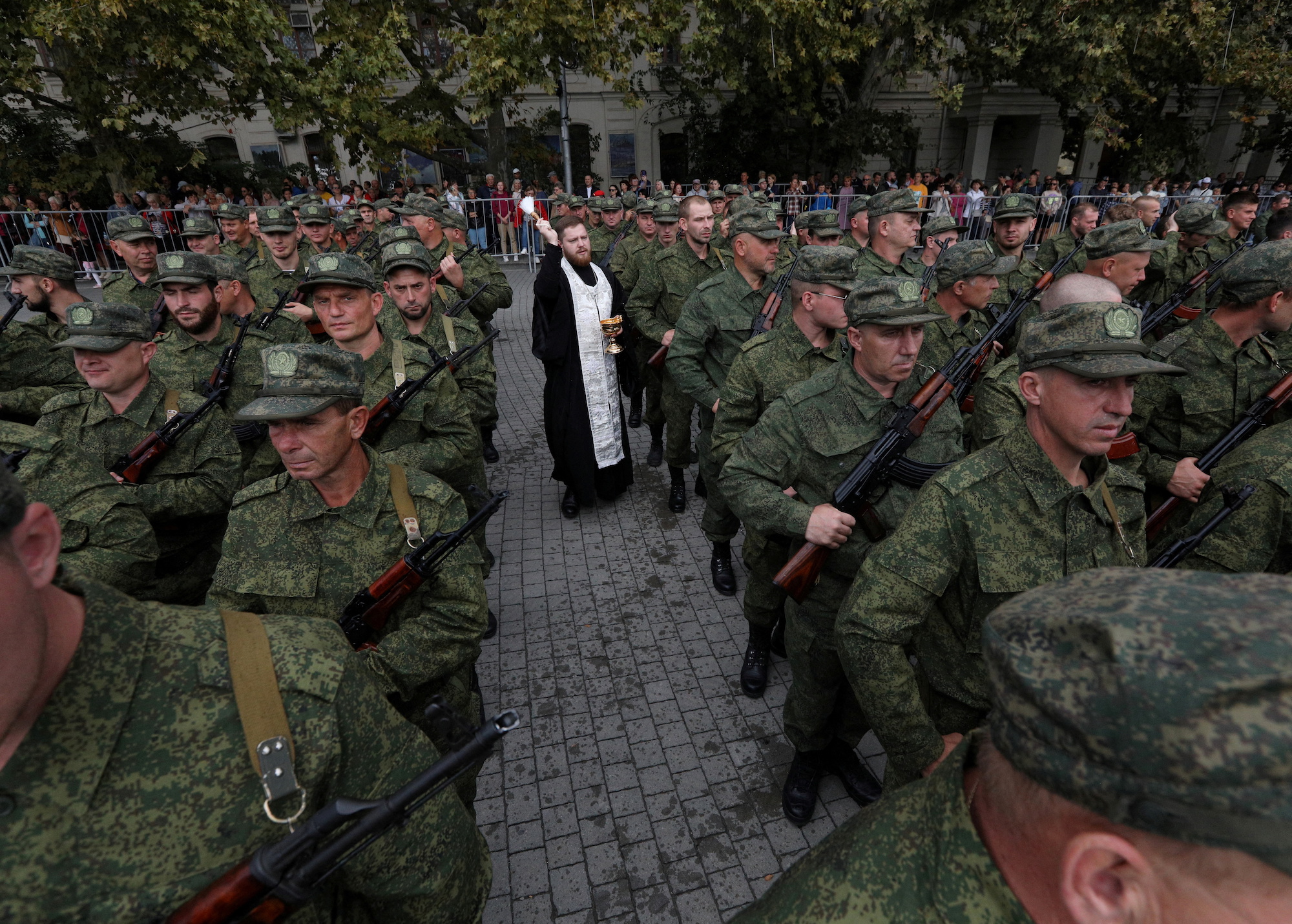 An Orthodox priest conducts a service for reservists drafted as part of the Russian mobilization in Sevastopol, Crimea, on September 27.
