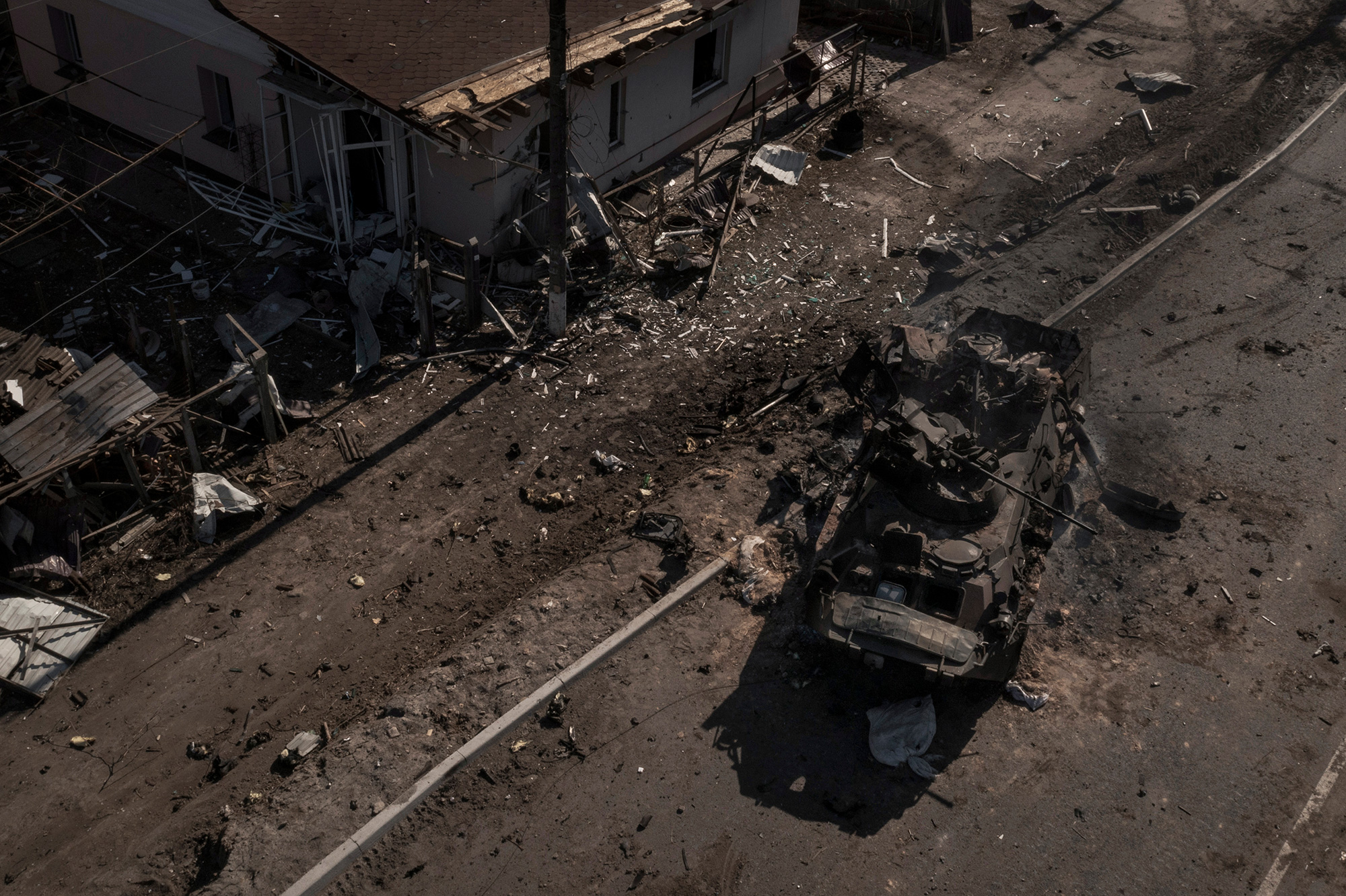 A destroyed Russian tank sits on a main road after a battle near Brovary, north of Kyiv, Ukraine, on March 10. 