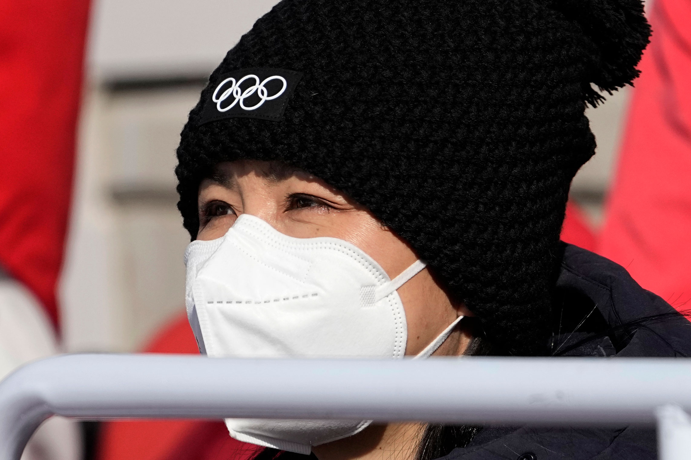 Chinese tennis star Peng Shuai watches the women's freestyle skiing big air finals on Tuesday.