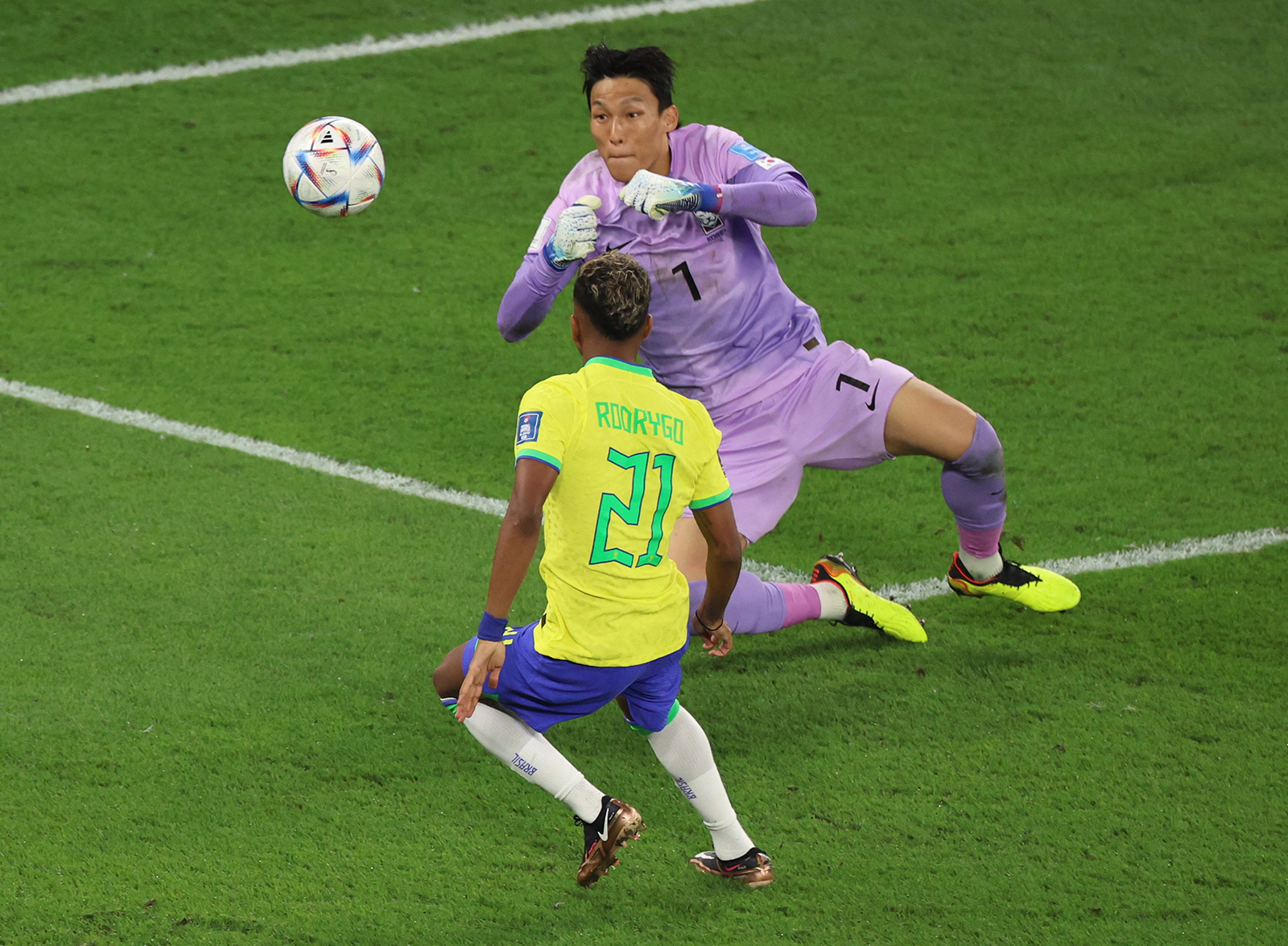 South Korea's Kim Seung-gyu saves a shot from Brazil's Rodrygo during the match between Brazil and South Korea at Stadium 974 on December 5.