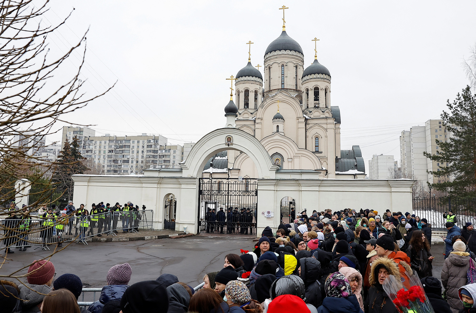 People gather outside the Soothe My Sorrows church as they wait for a funeral service and a farewell ceremony for Russian politician Alexey Navalny in Moscow, Russia, on March .