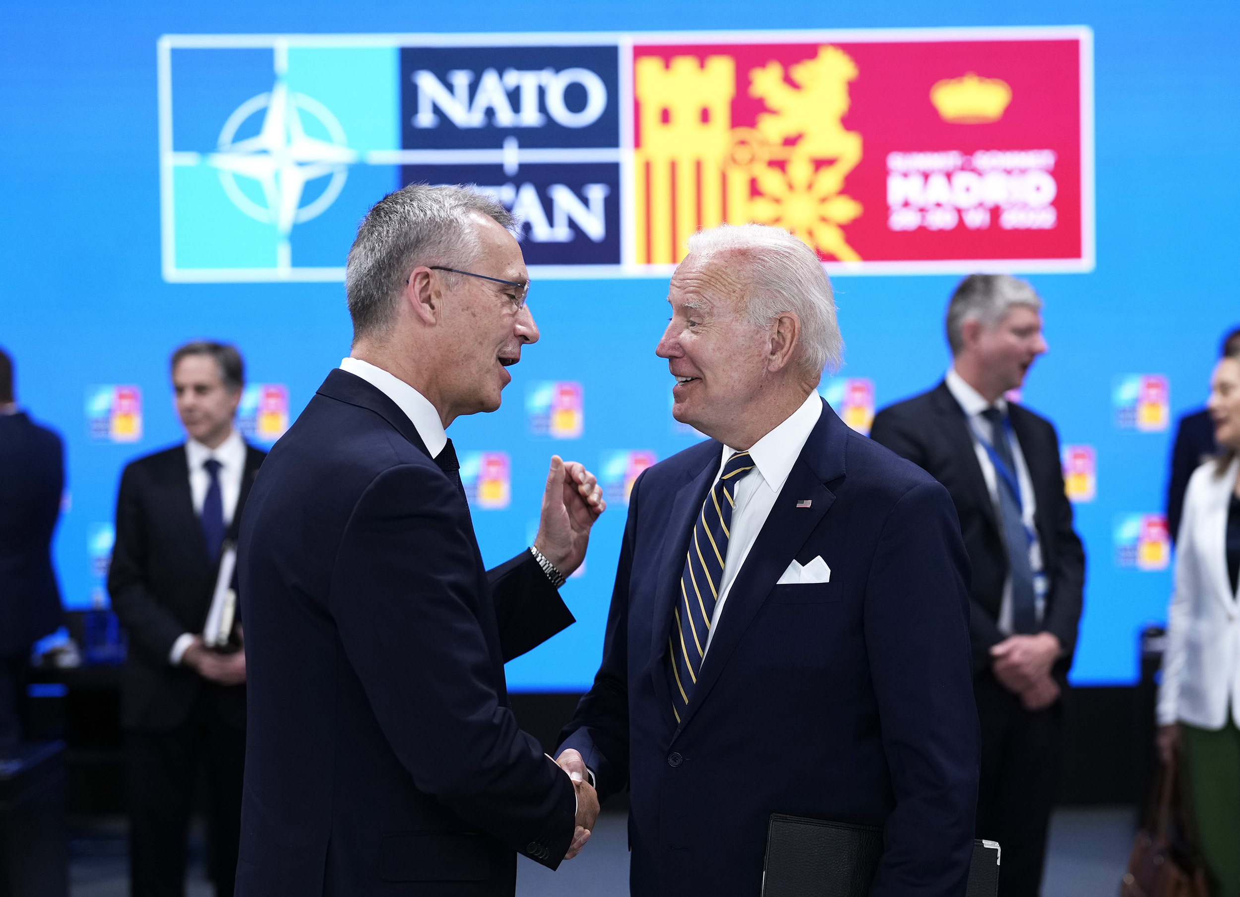 NATO Secretary General Jens Stoltenberg, left, speaks with U.S. President Joe Biden during a round table meeting at a NATO summit in Madrid, Spain, on June 30.