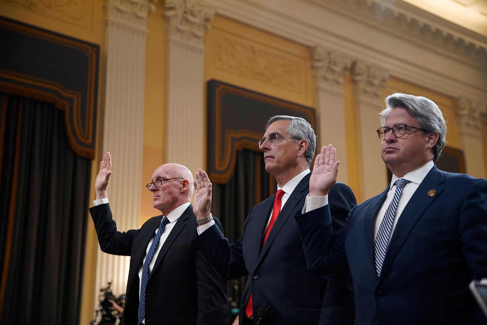 Rusty Bowers, Arizona House speaker, Brad Raffensperger, Georgia's Secretary of State, and Gabriel Sterling, Georgia's Secretary of State chief operating officer, are sworn in for a hearing of the Select committee on June 21. 