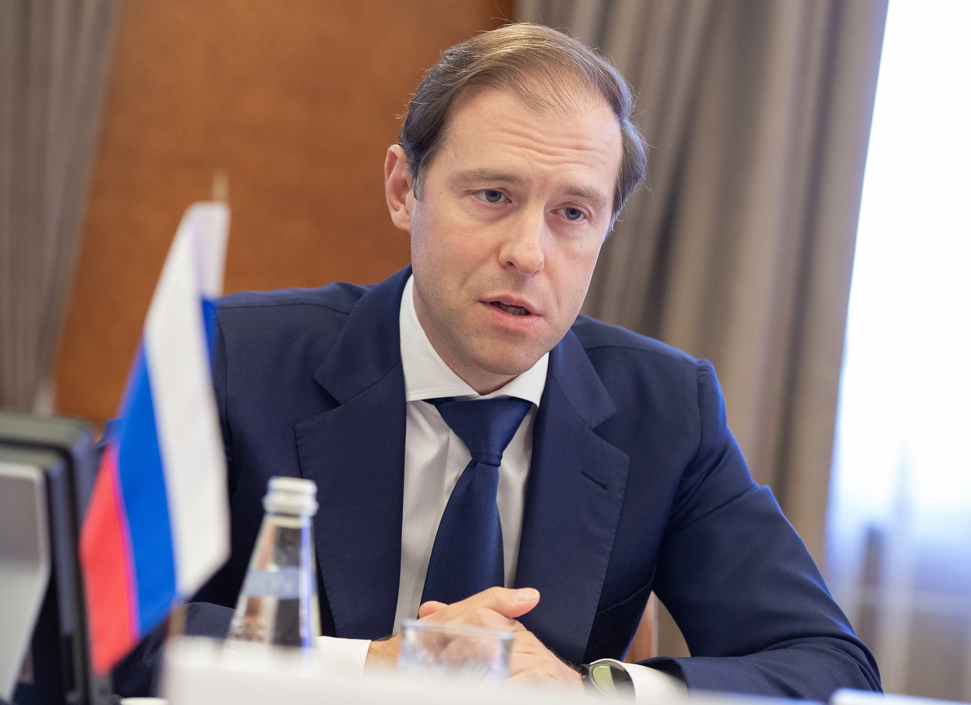 Russian Minister of Industry Denis Manturov meets with his German counterpart in Moscow, Russia, on May 14, 2018. He has now been sanctioned by the UK government.