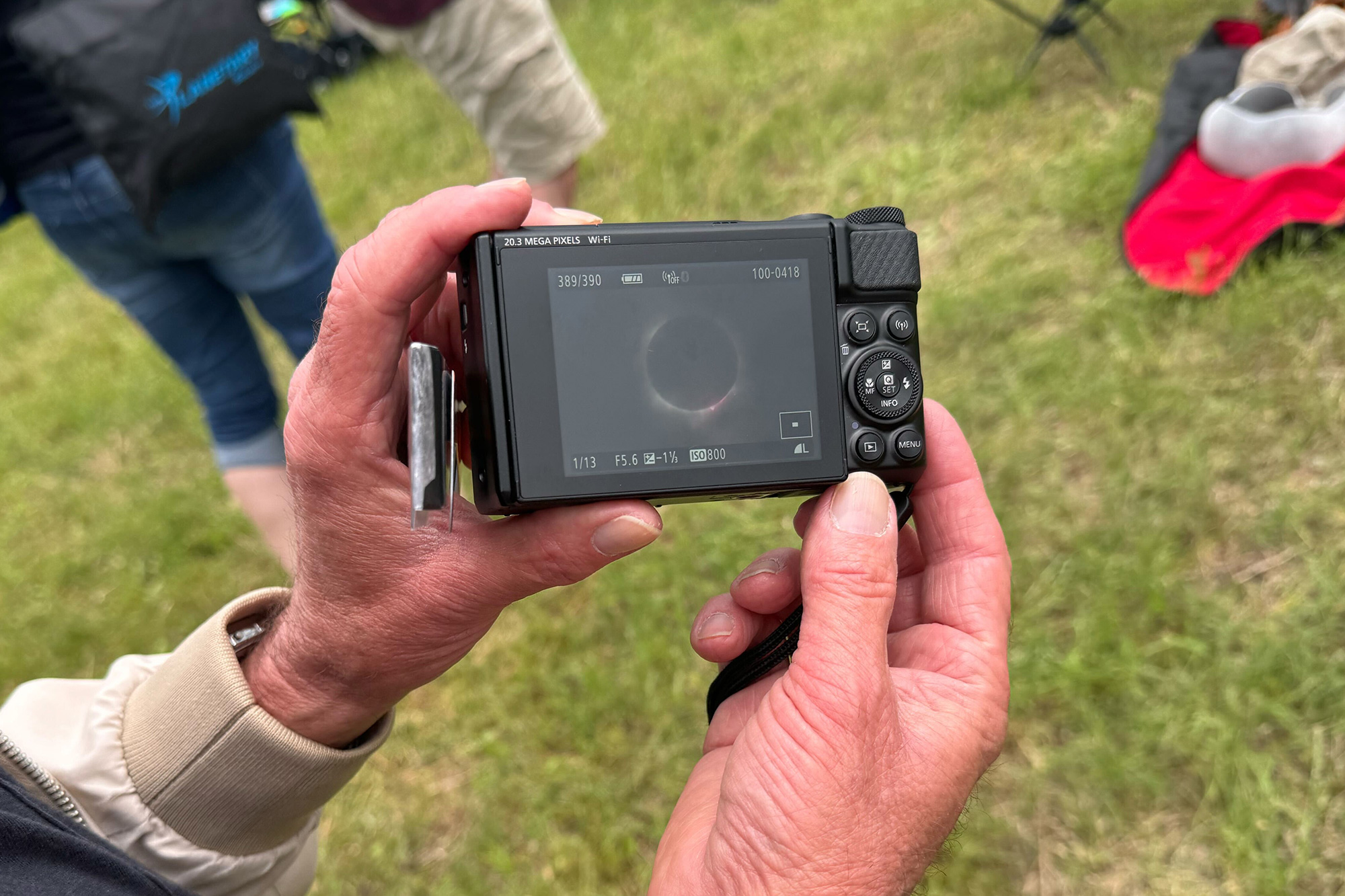 Canedo shows off his photos of totality.