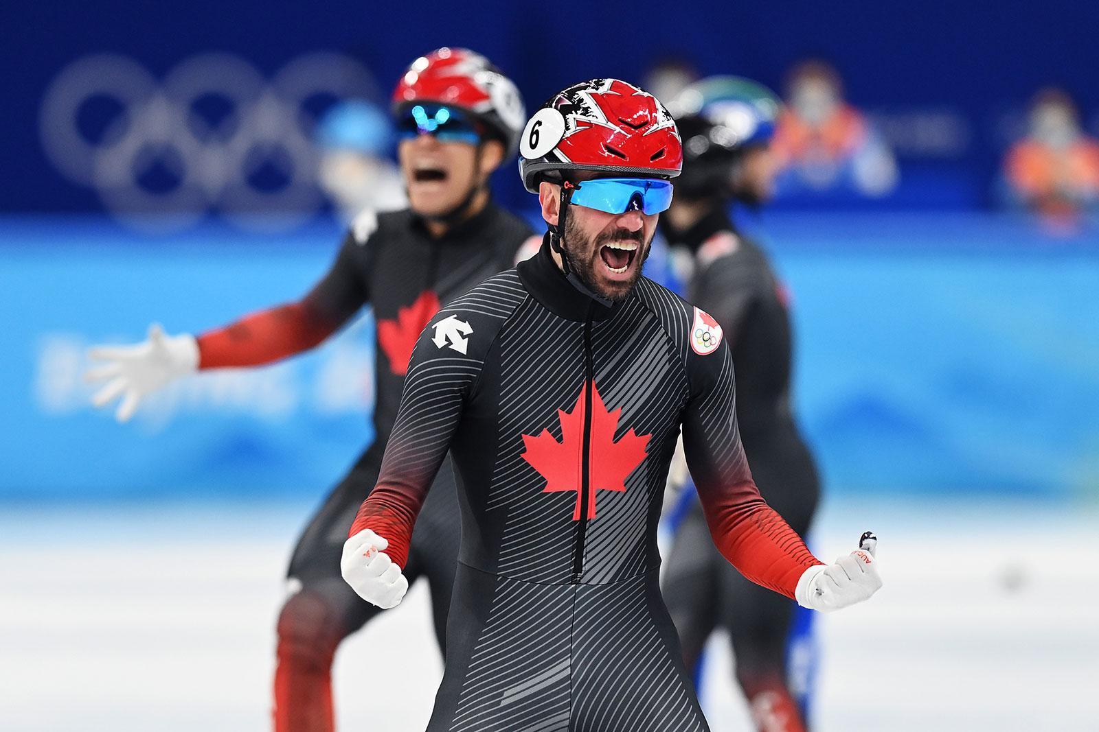 Canadian speed skater Charles Hemelin celebrates after winning the gold medal in the men's 5,000m relay on February 16.