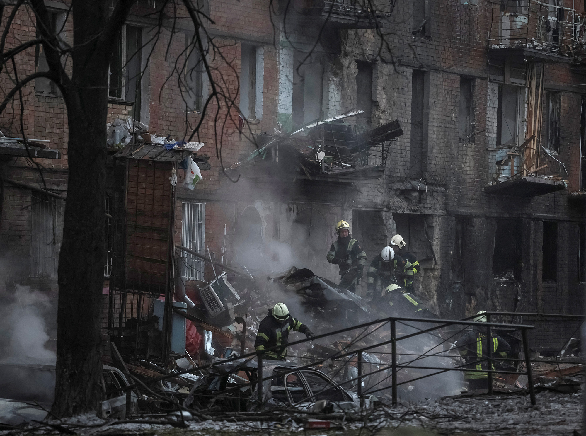 Rescuers work at a site of a residential building destroyed by a Russian missile attack in the suburb of Vyshhorod, Kyiv, on November 23.