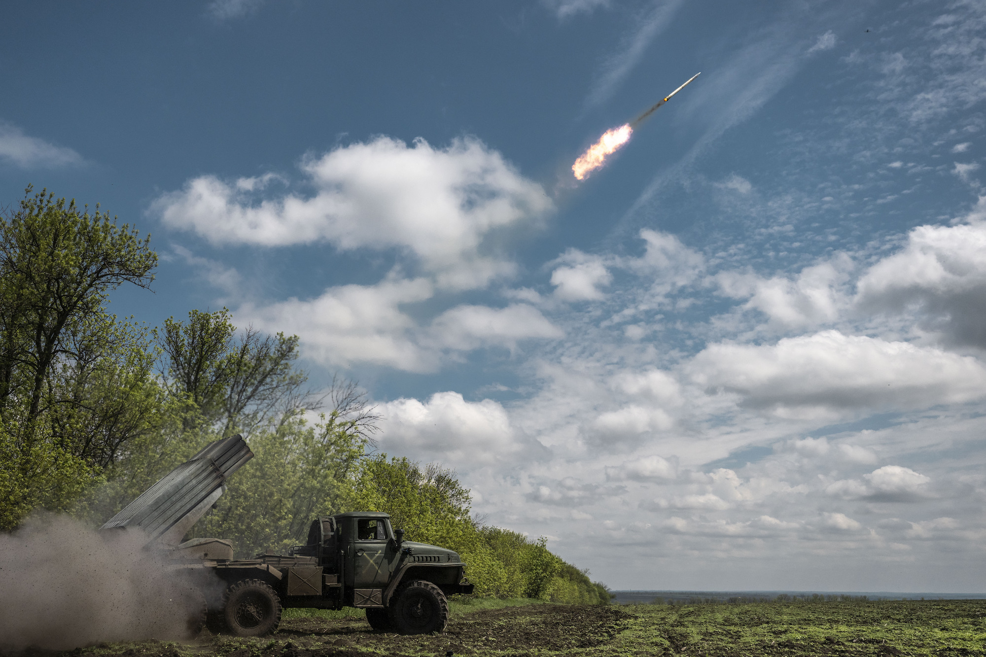 Ukrainian artillery rocket units fire towards the trenches of Russian forces in Donetsk on Tuesday.
