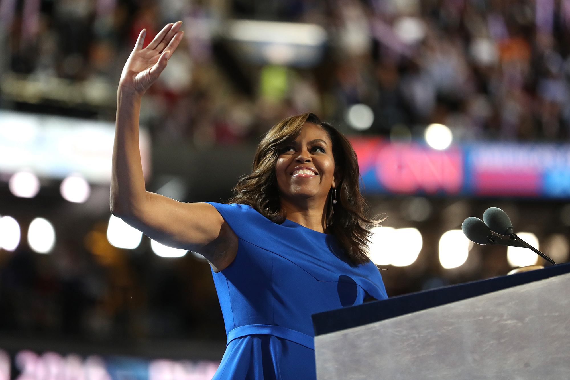 In this July 25, 2016 photo, then-First Lady Michelle Obama acknowledges the crowd after delivering remarks on the first day of the Democratic National Convention in Philadelphia Pennsylvania. 