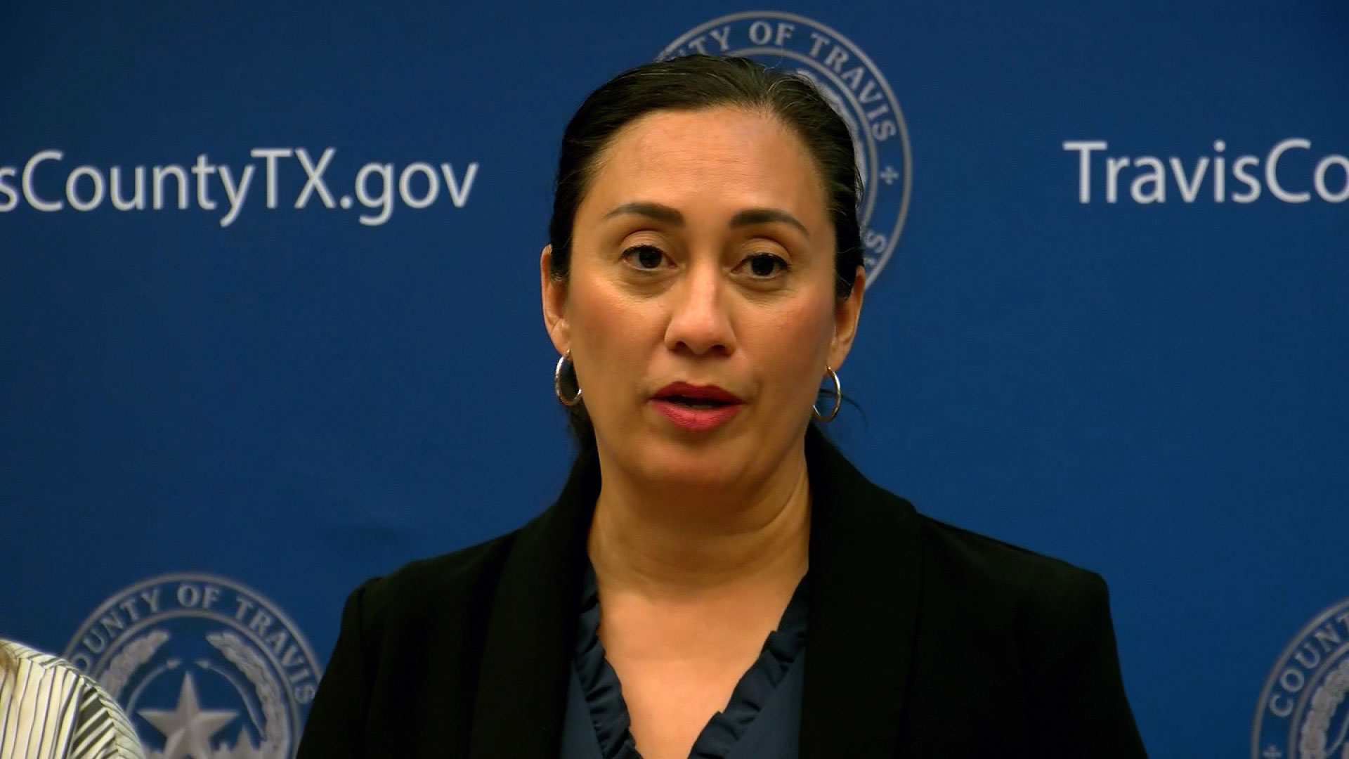Travis County prosecutor Delia Garza speaks at a press conference on Tuesday. 