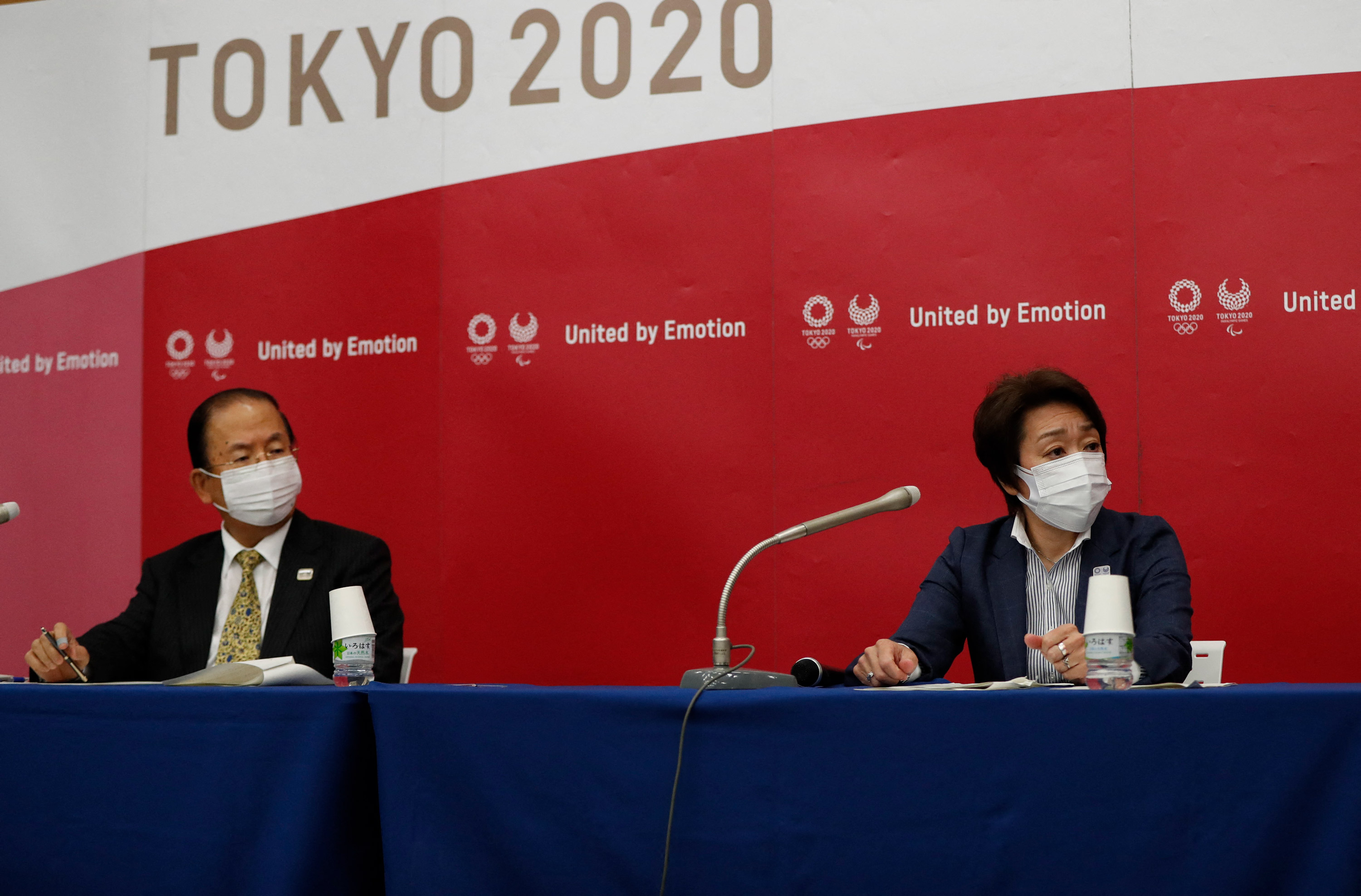 Tokyo 2020 Olympics Organising Committee president Seiko Hashimoto, right, and CEO Toshiro Muto attend a news conference in Tokyo on June 23.