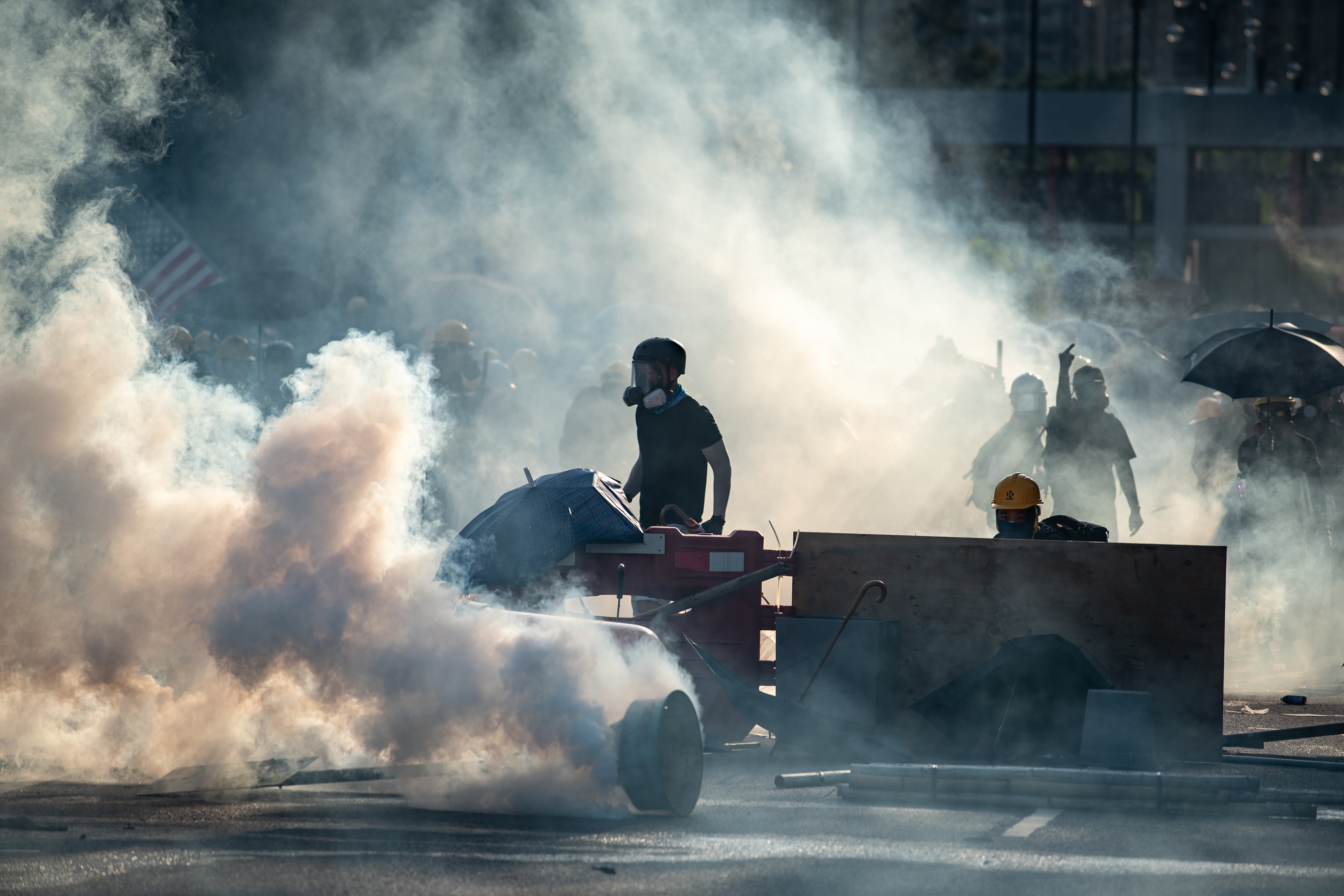 Protesters hold their ground after police fired tear gas in Tai Po district on August 5, 2019.