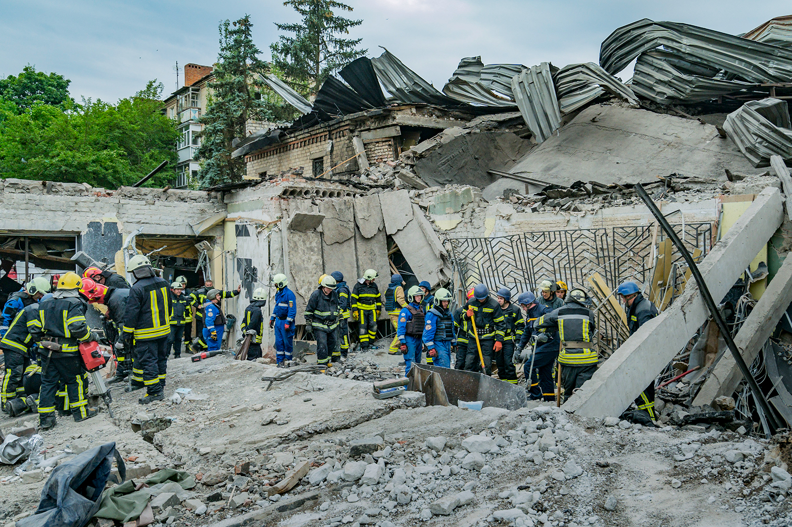 Rescue works in the center of the impact of a Russian missile strike in Kramatorsk, Ukraine on June 29.